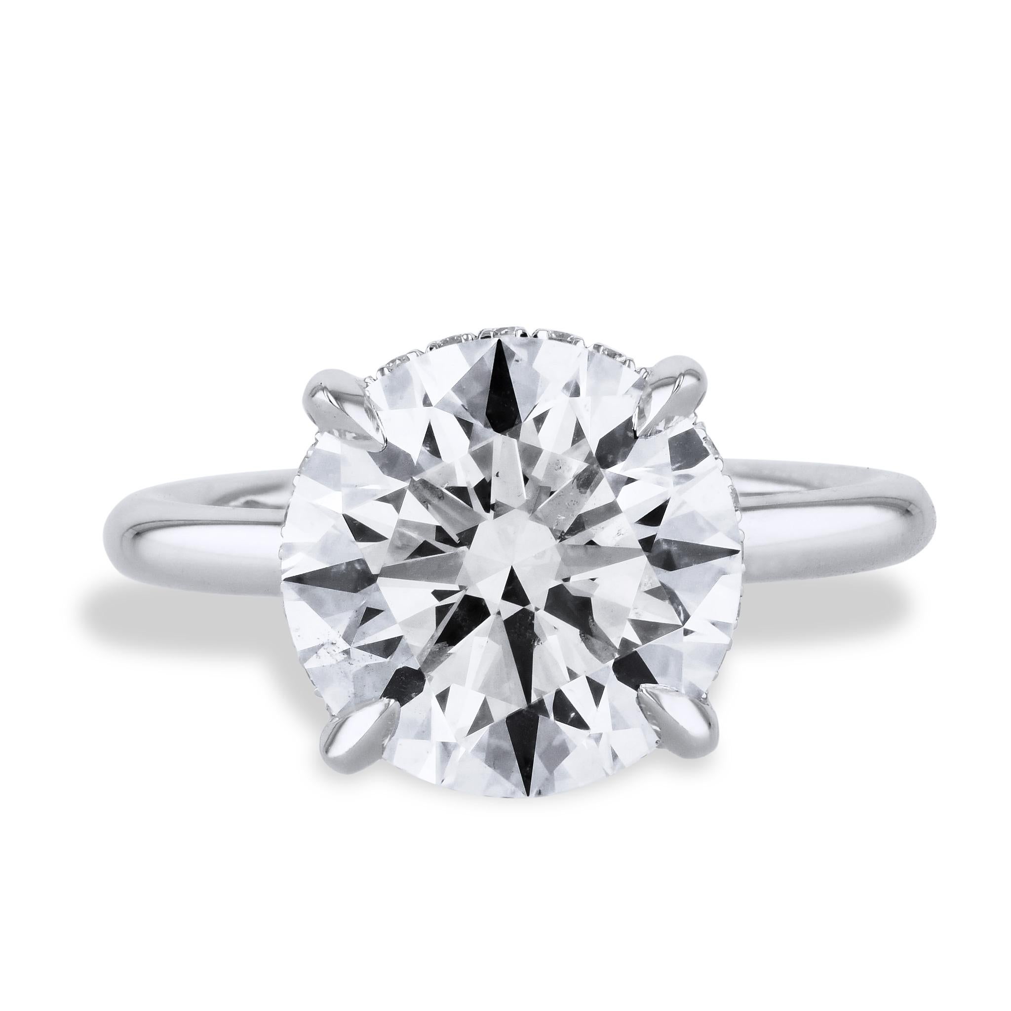 Round Cut GIA Certified 5.07 Carat Handmade Solitaire Diamond Platinum Engagement Ring For Sale