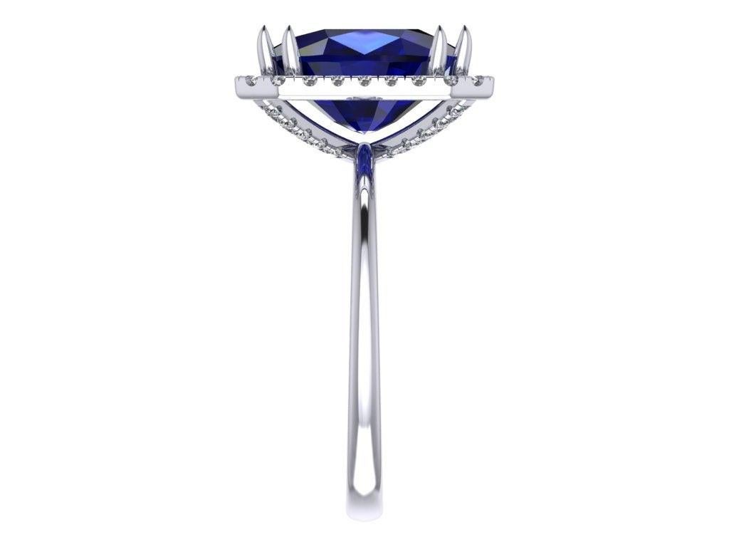 Contemporary GIA Certified 5.08 Carat Cushion Blue Sapphire Diamond Halo Platinum Ring For Sale