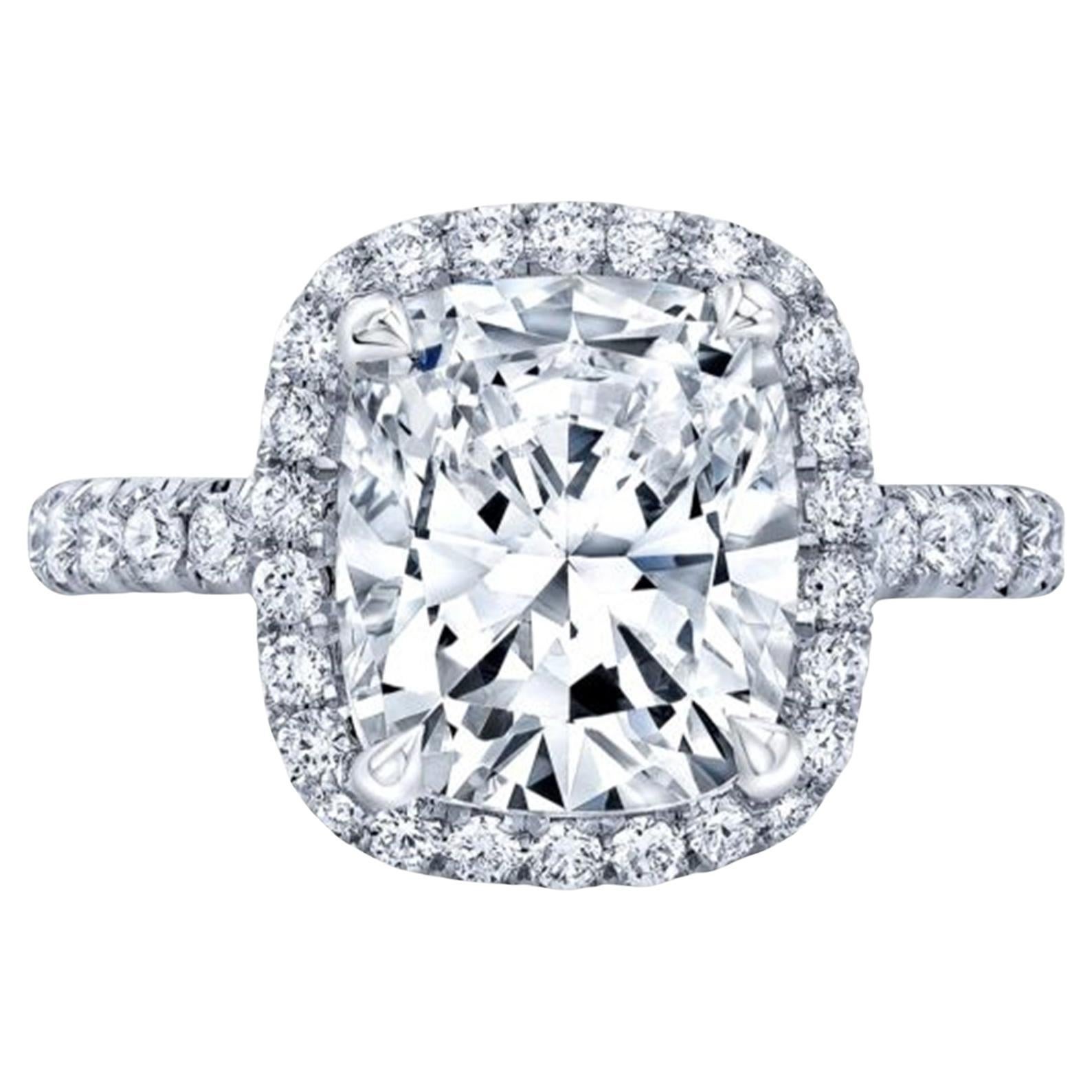 GIA Certified 5.02 Carat Cushion Halo Diamond Ring with Pavè in 18K White Gold