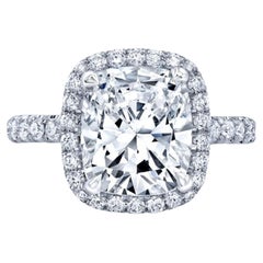 GIA Certified 5.02 Carat Cushion Halo Diamond Ring with Pavè in 18K White Gold