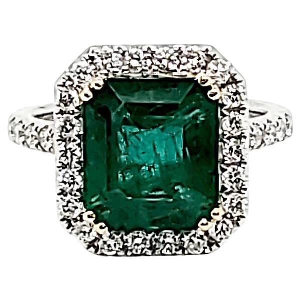 GIA Certified 5.08 Carat Emerald and White Diamond White and Yellow Gold Ring
