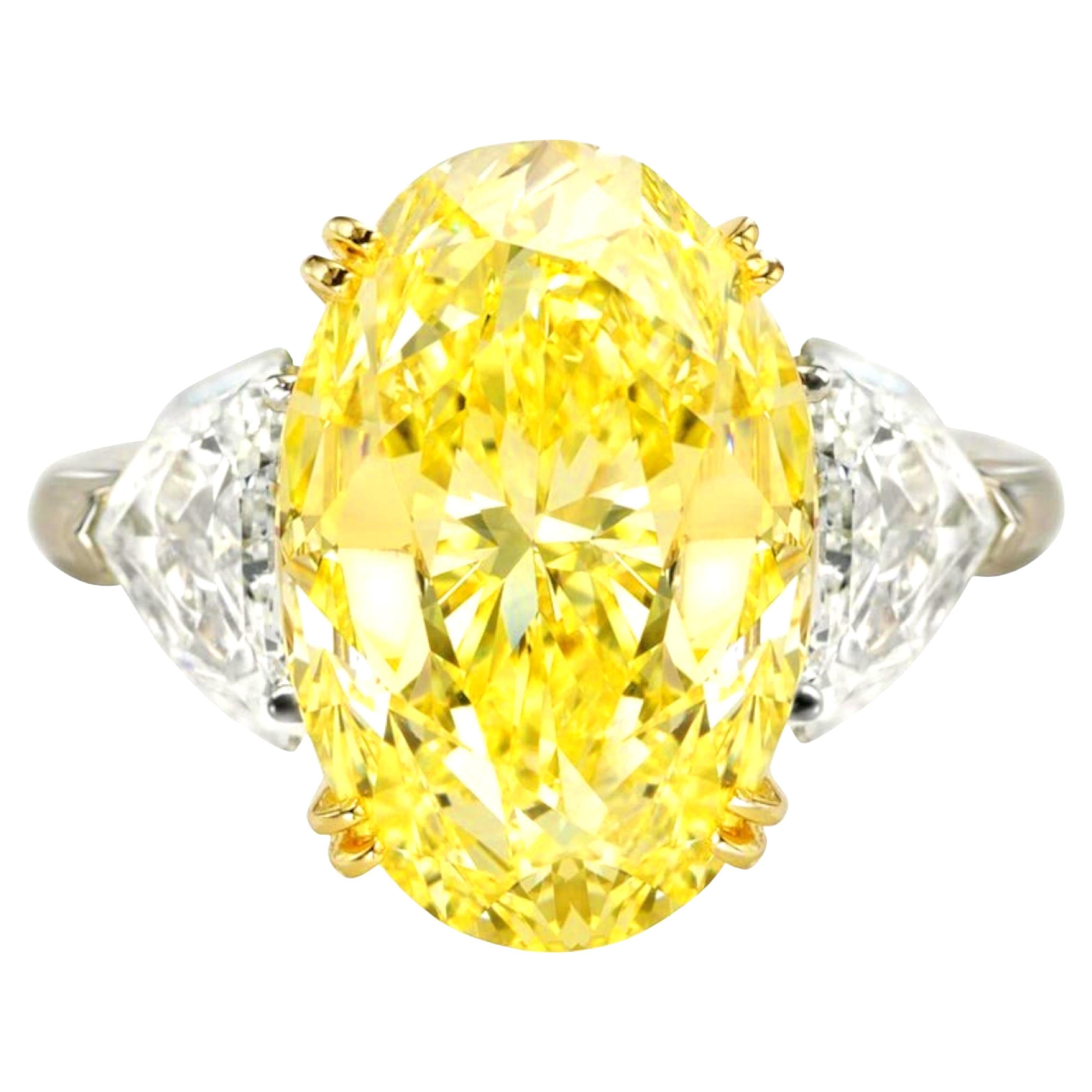 GIA Certified 5.08 Carat Fancy Yellow Oval Cut Diamond Platinum Ring
