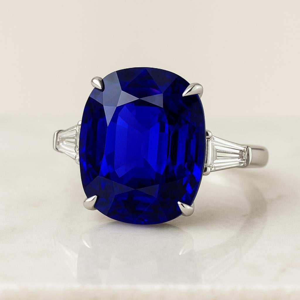 Contemporary GIA Certified 5.09 Carat Blue Sapphire and Tapered Baguette Diamond Ring For Sale