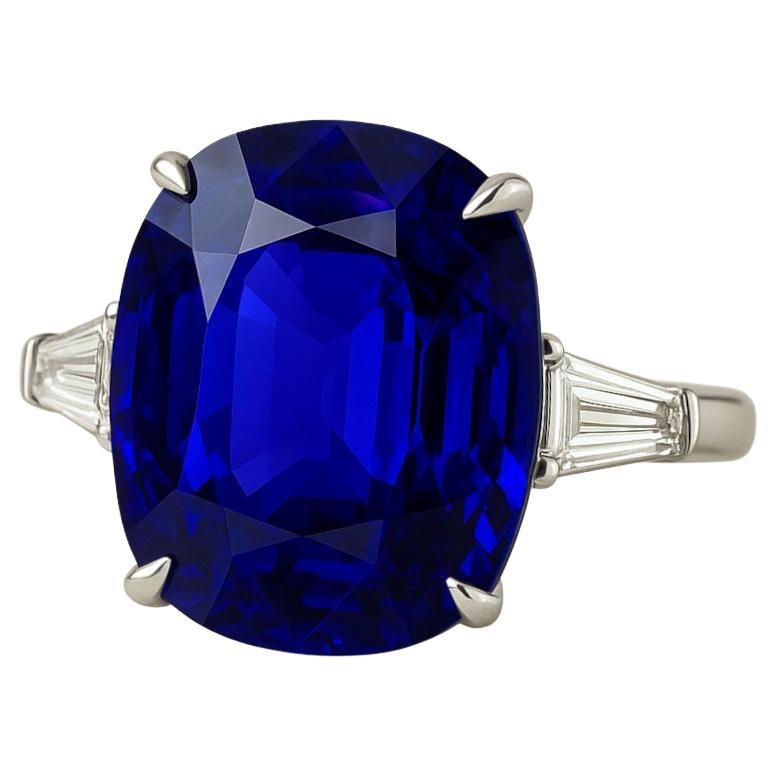 GIA Certified 5.09 Carat Blue Sapphire and Tapered Baguette Diamond Ring For Sale