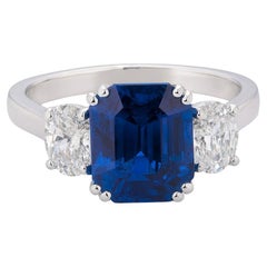 Anello in platino a tre pietre con diamante e zaffiro certificato GIA da 5,11 carati
