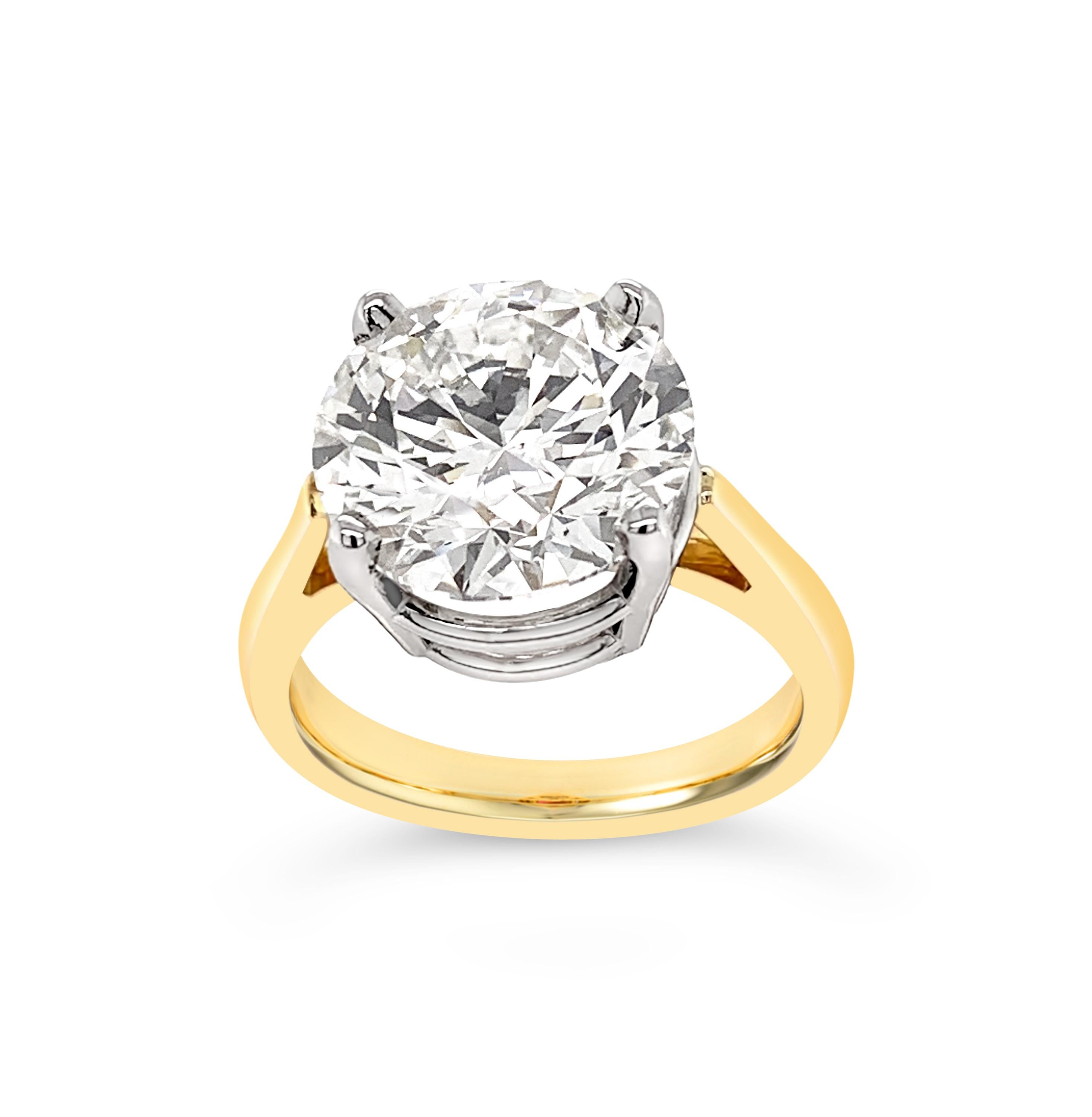Stunning 5.11 Carat Diamond set in 18K Yellow Gold ring with Platinum mounting.  Diamond is GIA Certified as 