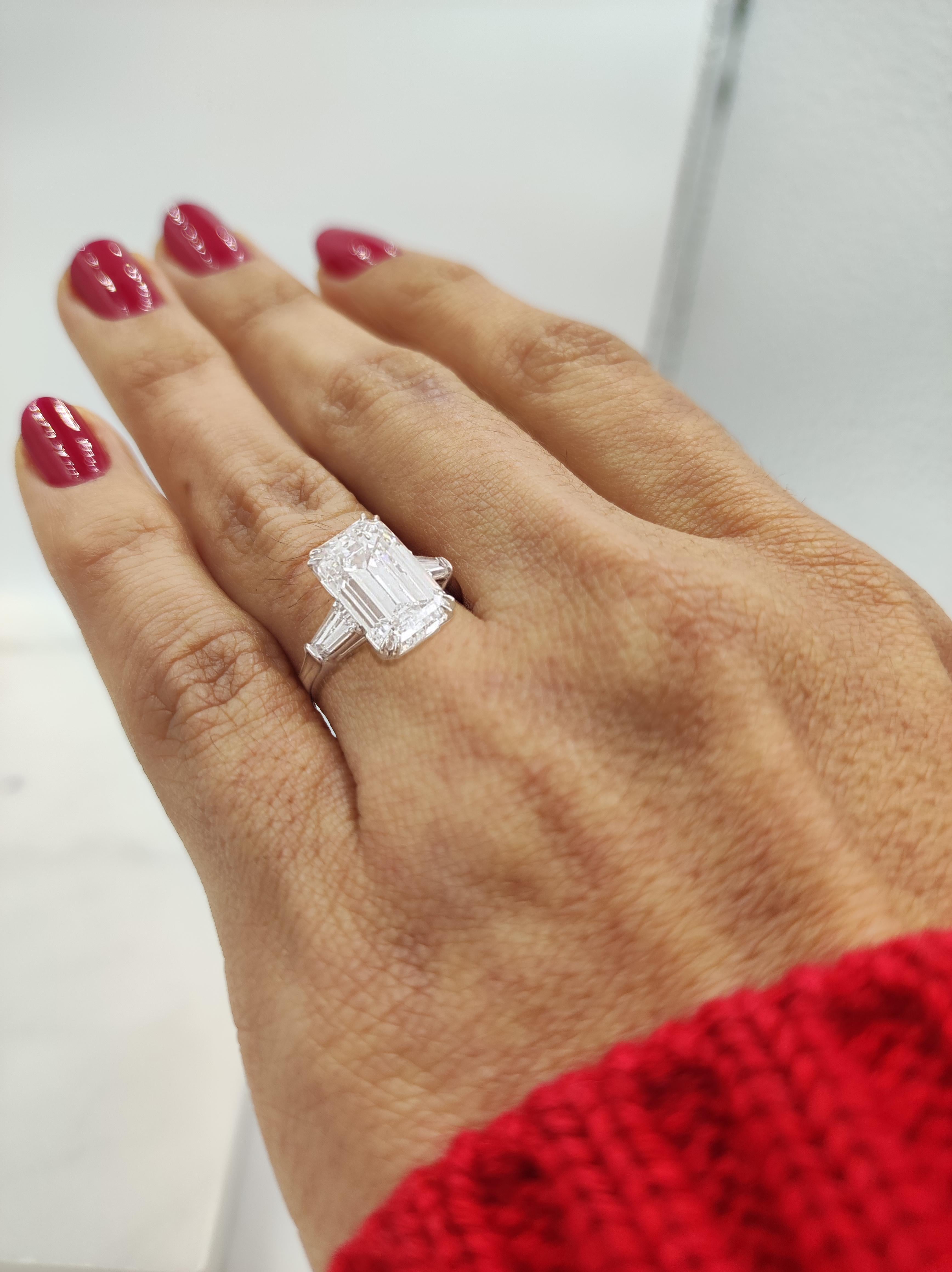Women's or Men's GIA Certified 5.02 Carat Emerald Cut Diamond Ring with Tapered Baguette For Sale