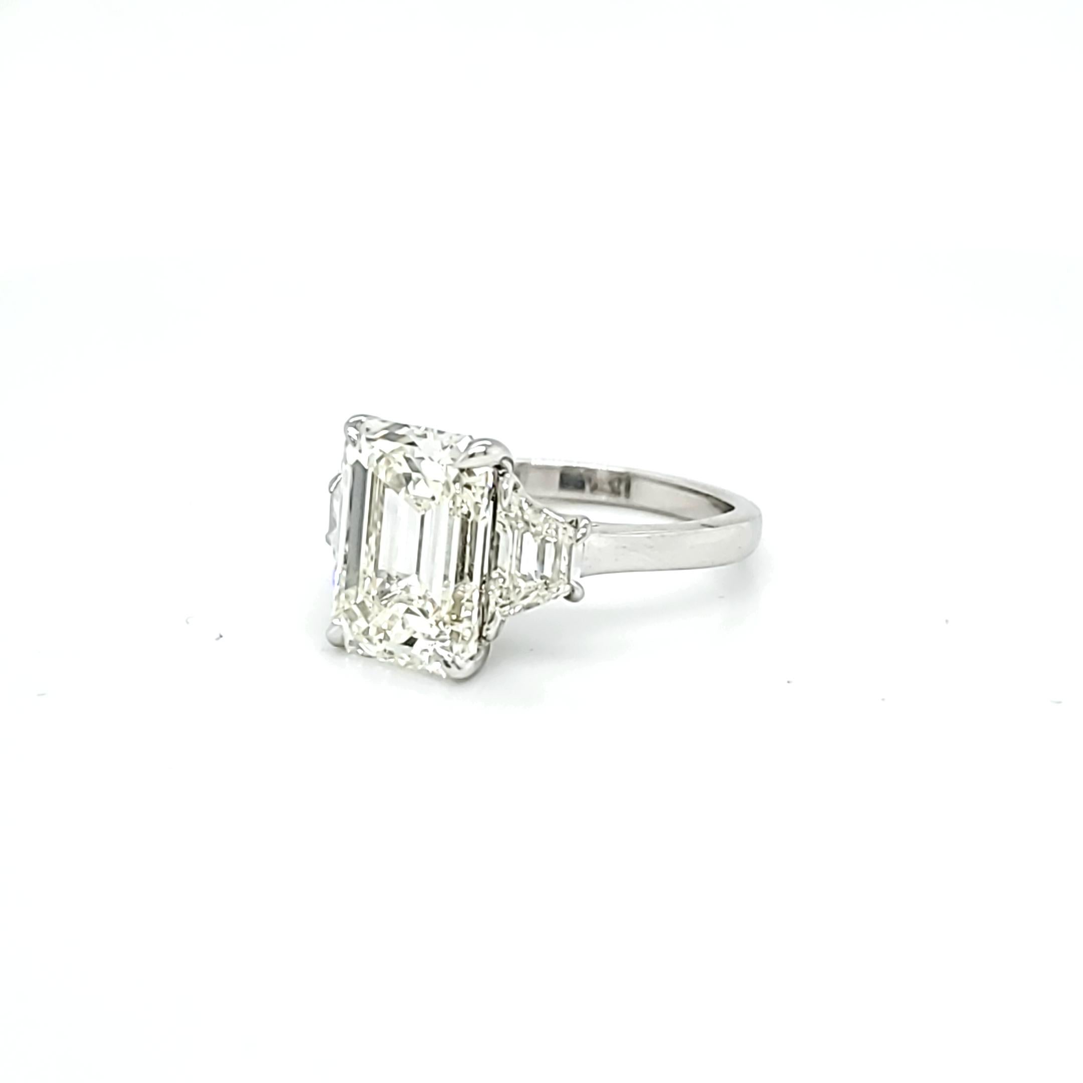 Women's GIA Certified 5.12 Carat Emerald Cut Three-Stone Ring