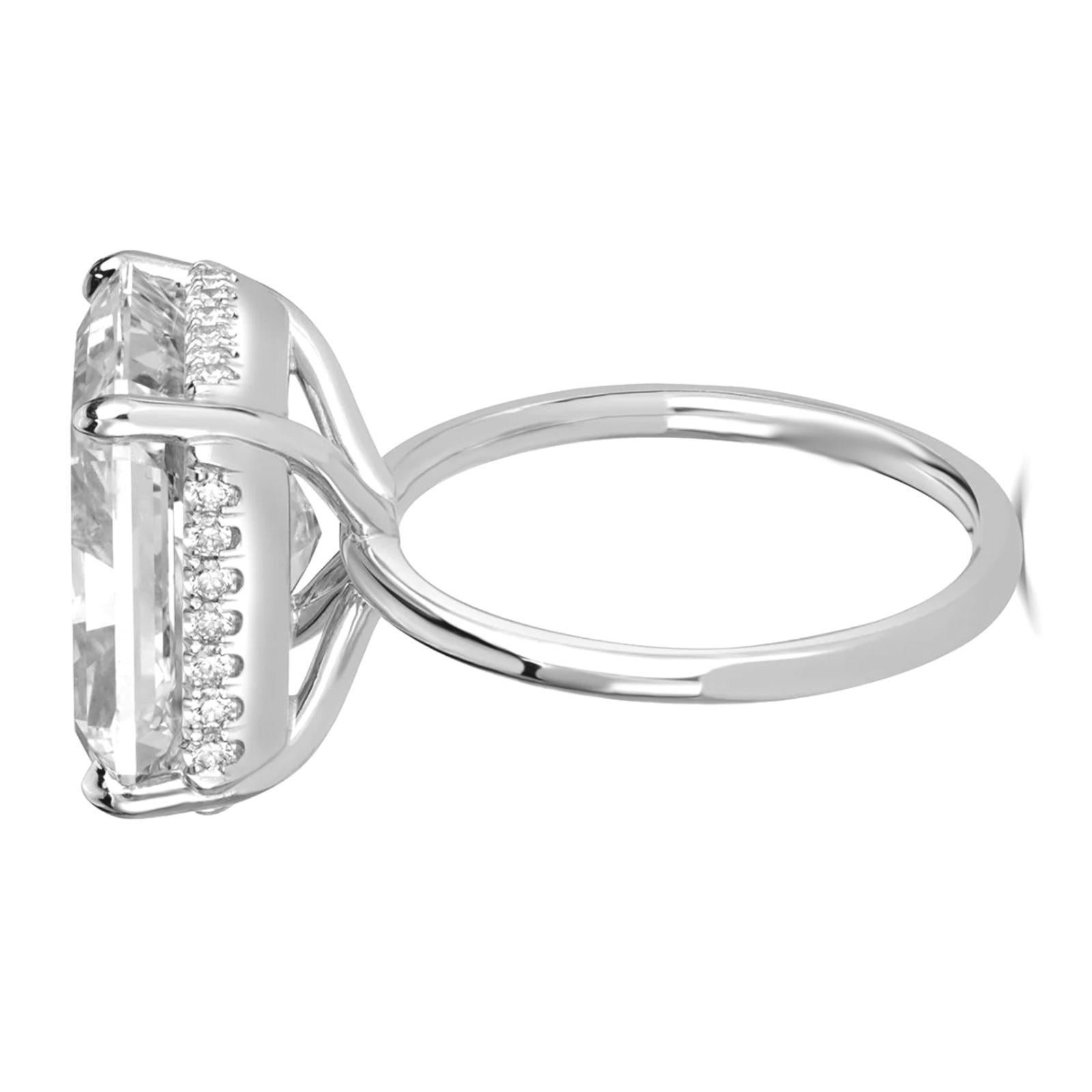 A GIA Certified 5.12-carat Radiant Cut Diamond Platinum Ring, complemented by g color, VS2 clarity. The radiant cut's step facets combined with the brilliance of high-color, high-clarity trapezoid diamonds ensure maximum light performance and