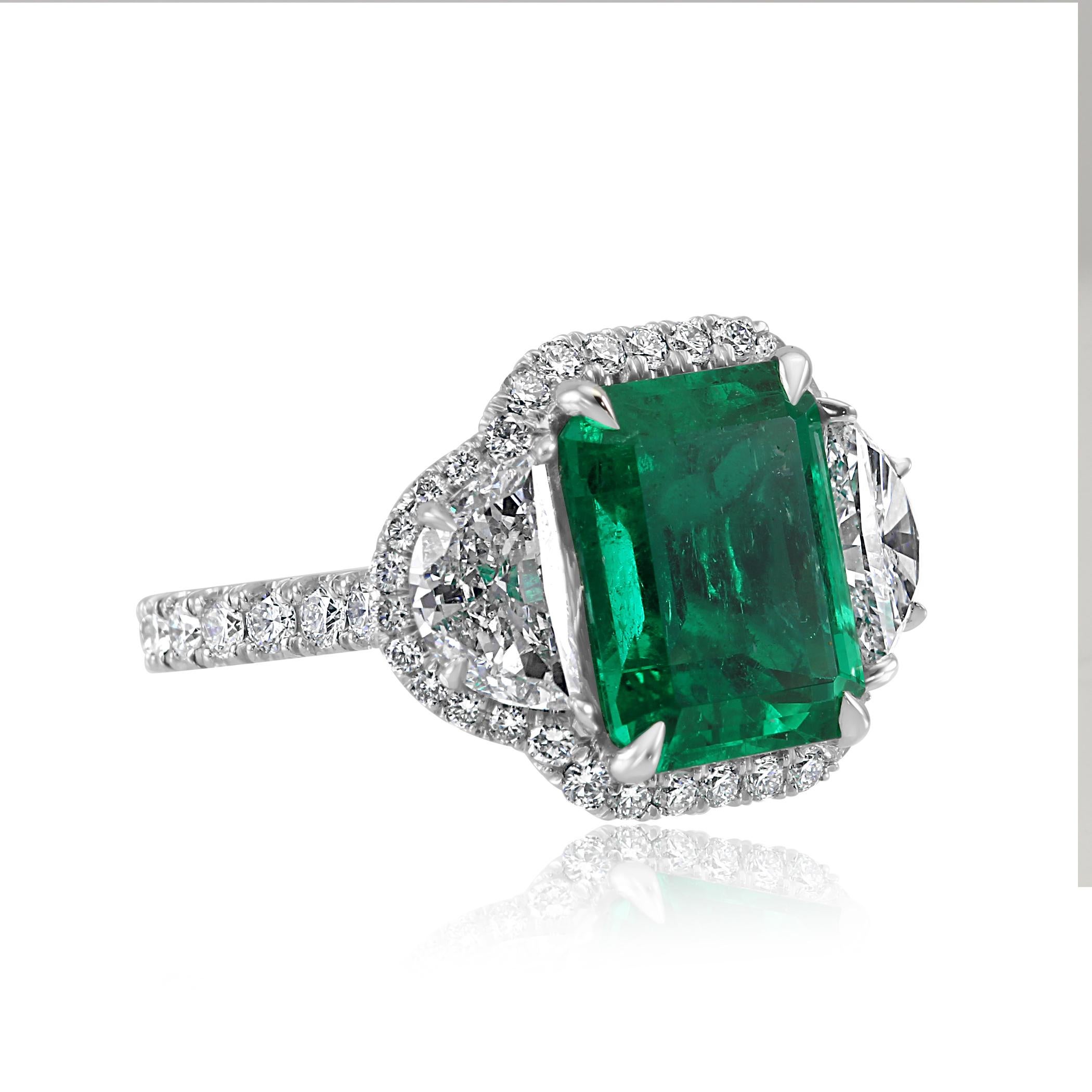 Contemporary GIA Certified 5.13 Carat No Enhancement Colombian Emerald Three-Stone Ring