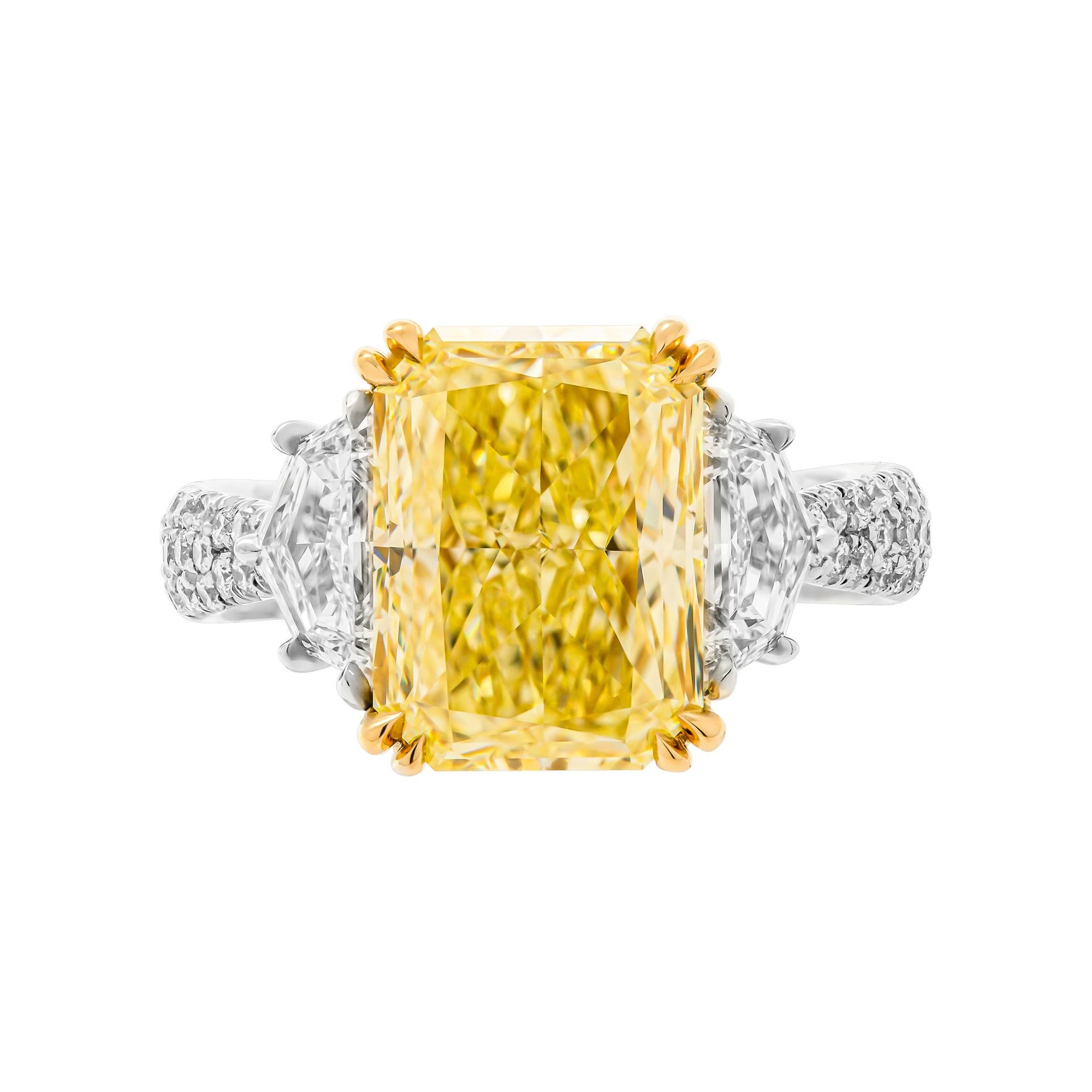 3 stone Ring in Platinum & 18K Yellow Gold
Center stone details: 
5.01ct Natural Fancy Yellow Even SI1 Radiant Shape Diamond GIA#5222019972
Side stone: 0.92ct Cadillacs F/VS 
Setting features diamond cathedral 3 row shank & diamond bridge
Size:
