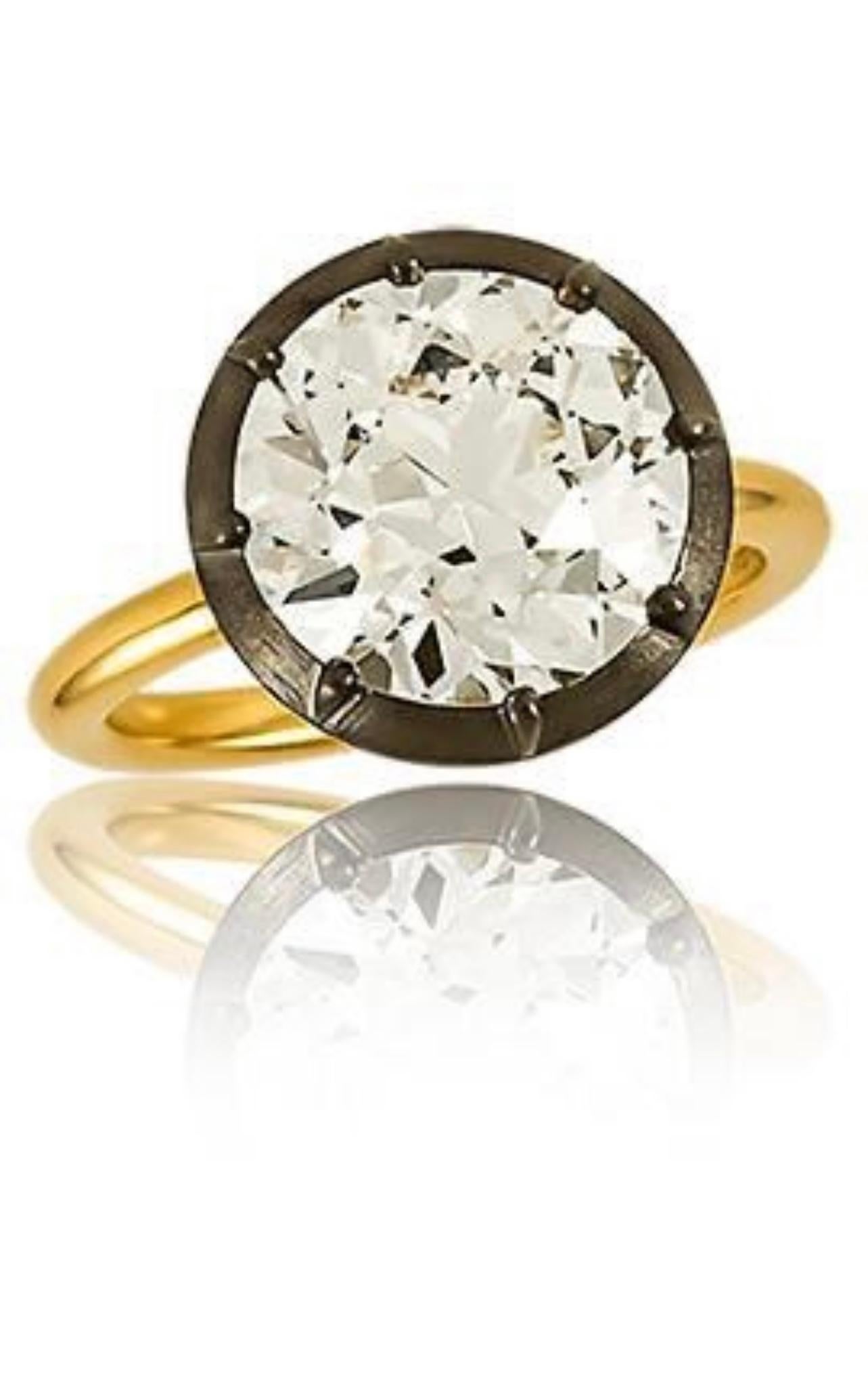 Une beauté à couper le souffle ! 

Bague de fiançailles en diamant européen brillant certifié GIA de 5,14 carats, magnifiquement travaillée à la main en or jaune 18k et en argent. 

Les détails sont les suivants : 
Diamant brillant de type européen