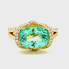 Anello in oro giallo con diamante rotondo e tormalina Paraiba certificato GIA 5,14