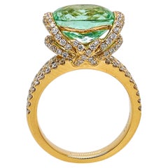 Anello in oro giallo con diamante rotondo e tormalina Paraiba certificato GIA 5,14