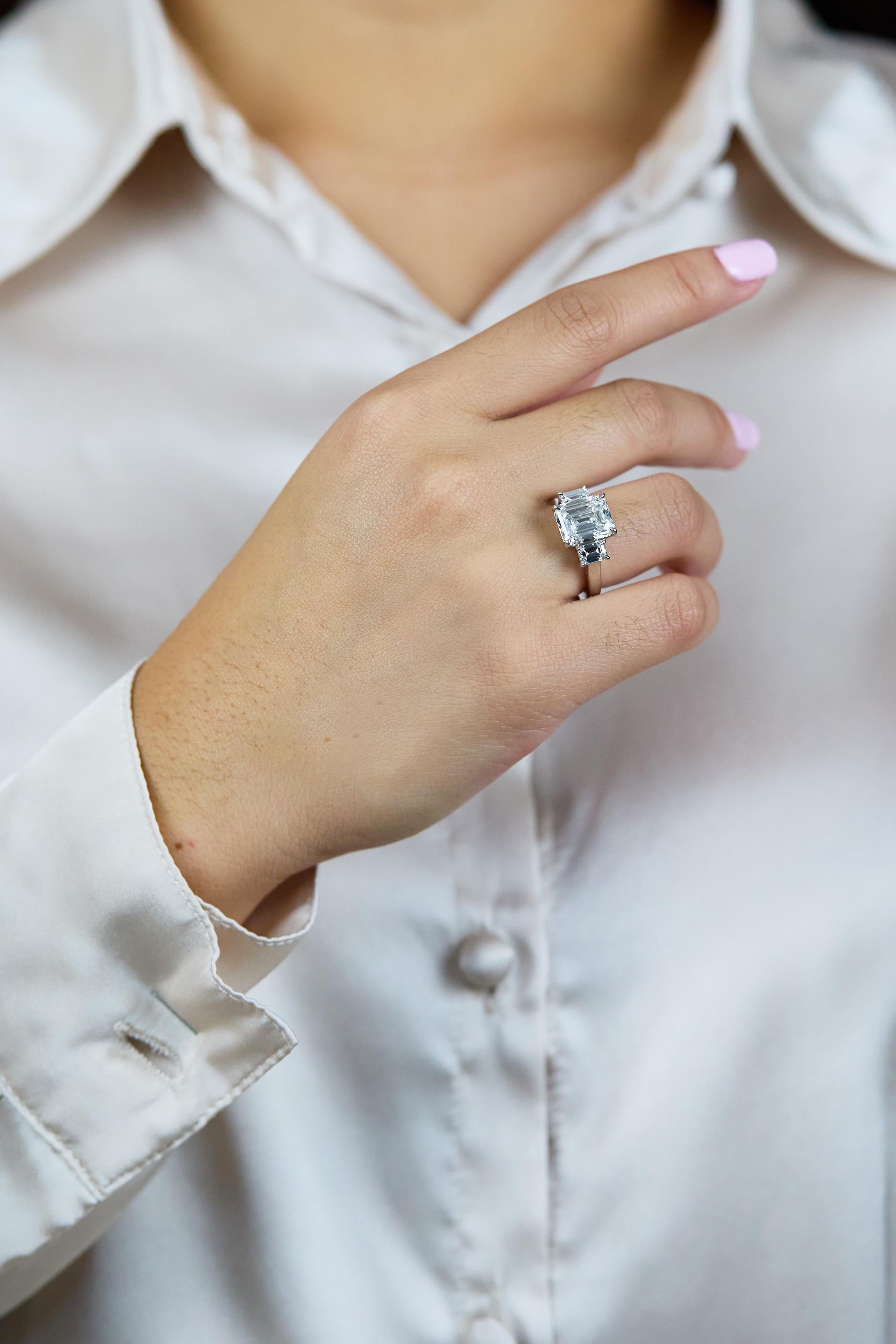 GIA Certified 5.16 Carats Emerald Cut Diamond Three-Stone Engagement Ring In New Condition For Sale In New York, NY