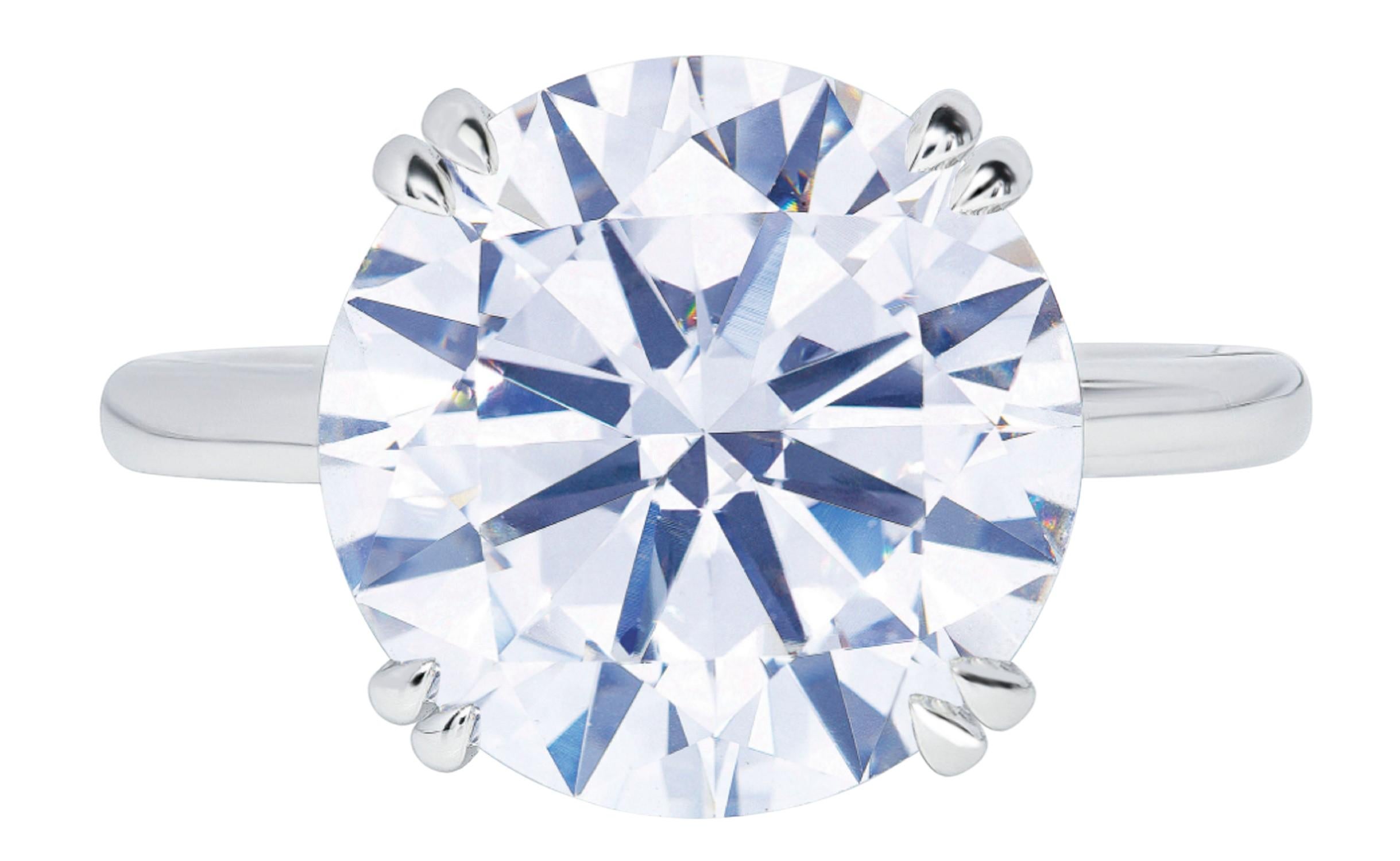 Modern GIA Certified 5.41 Carat Round Brilliant Cut Diamond Platinum Ring