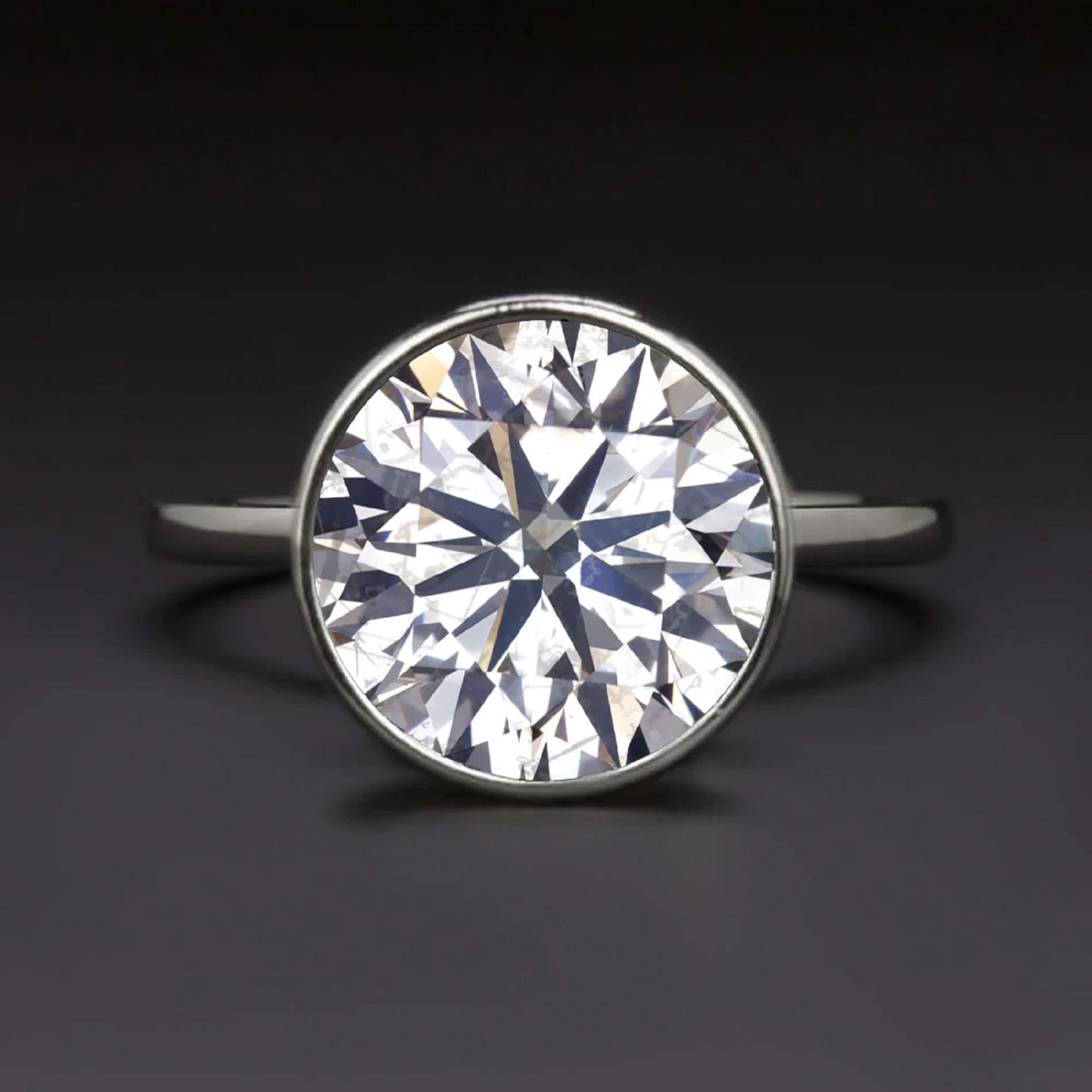 Round Cut GIA Certified 5.19 Carat Round Brilliant Cut Diamond Ring For Sale