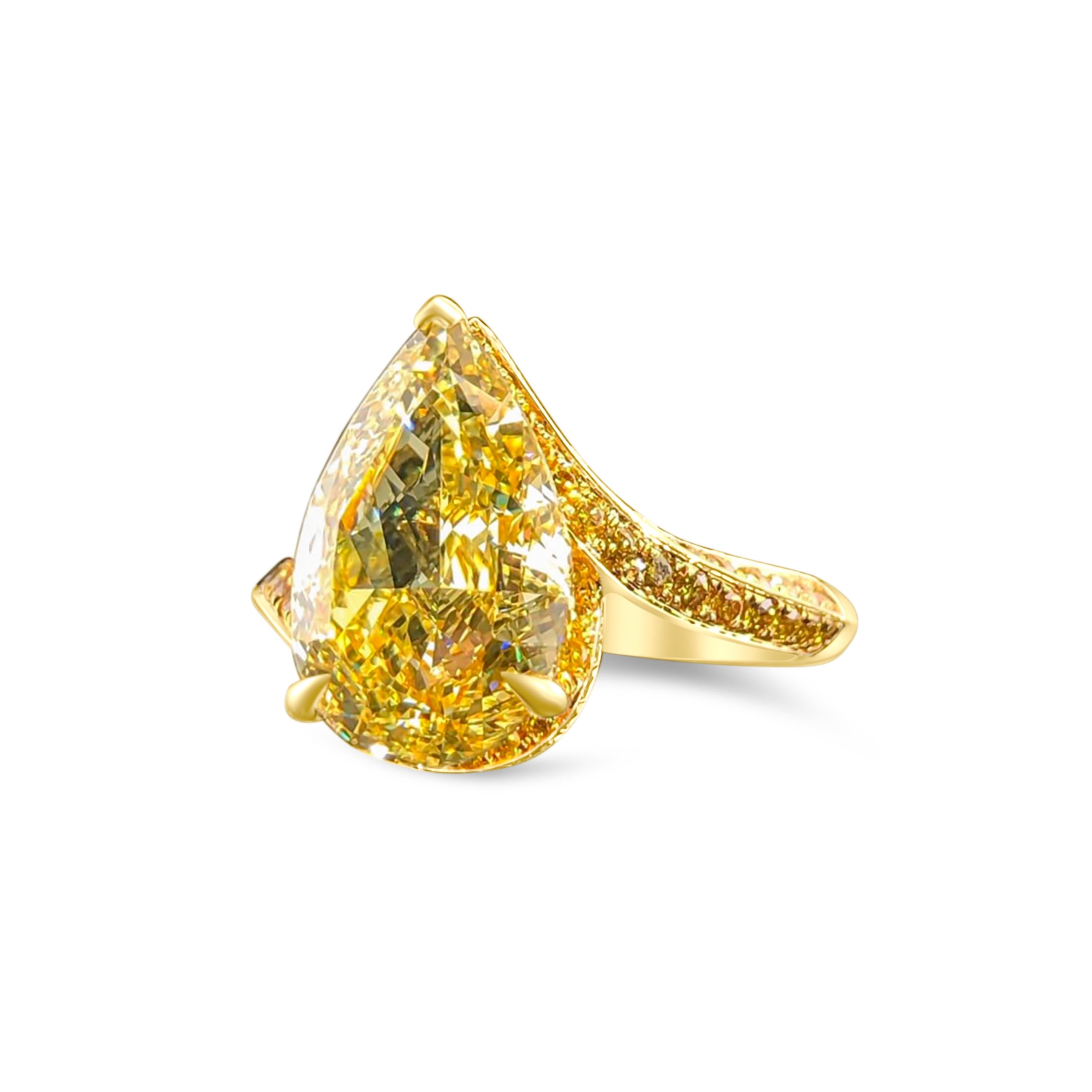We invite you to discover this elegant and minimalist engagement ring set with a 5,23 carat GIA certified Fancy Light Brownish Yellow pear diamond. The asymmetry of its ring will add a touch of originality to this magnificent jewel

New ring 
Main