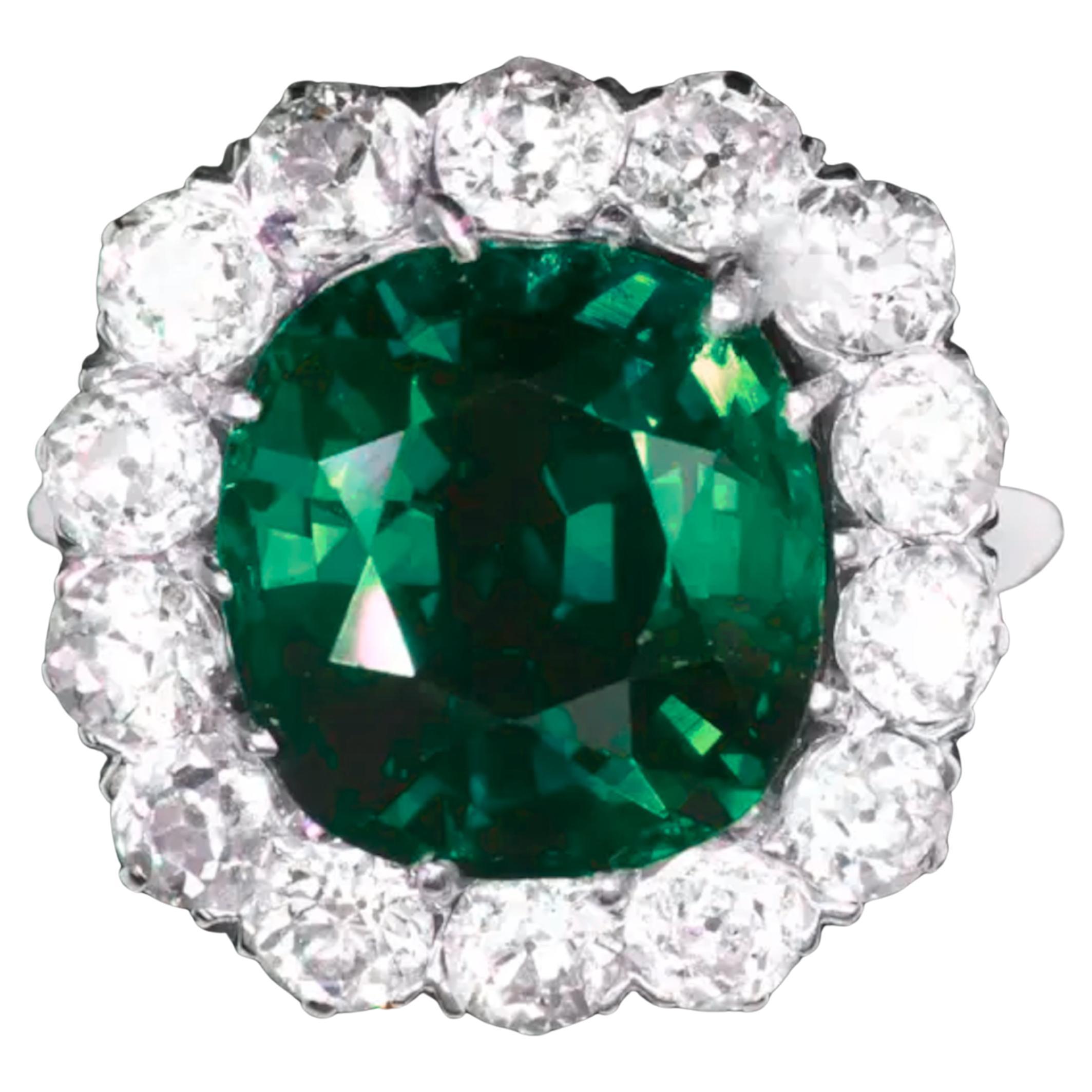 Indulge in timeless elegance with this breathtaking ring, featuring a substantial 5.26-carat cushion-cut intense green certified by GIA. this gem boasts a gorgeous royal green hue with remarkable brilliance.

Encircled by a dazzling halo of