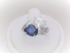 GIA Certified 5.28 Carat Corundum Sapphire and Antique Pear Diamond Bypass Ring