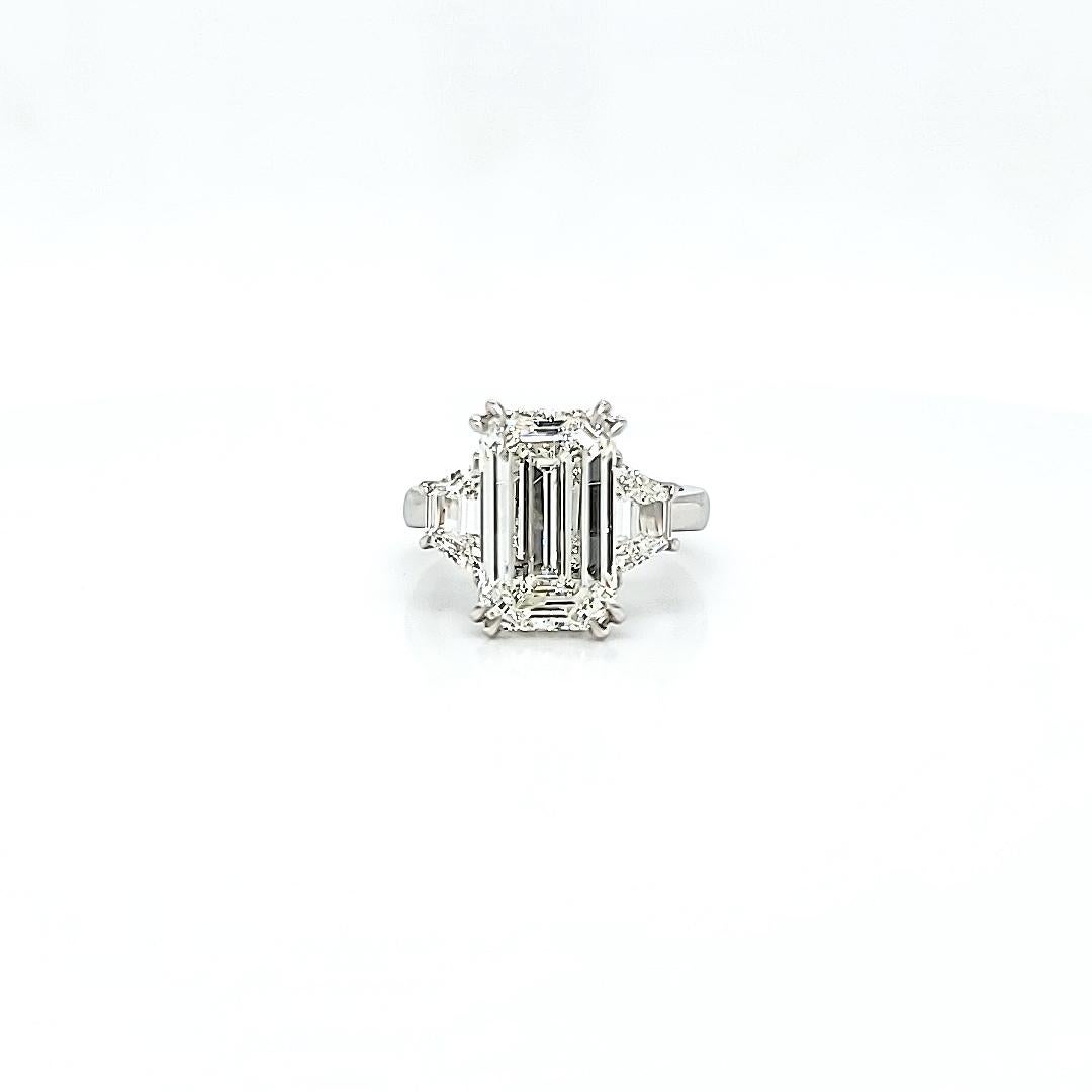 GIA Certified 5.30 Carat Emerald Cut Diamond Three Stone Ring In New Condition In New York, NY