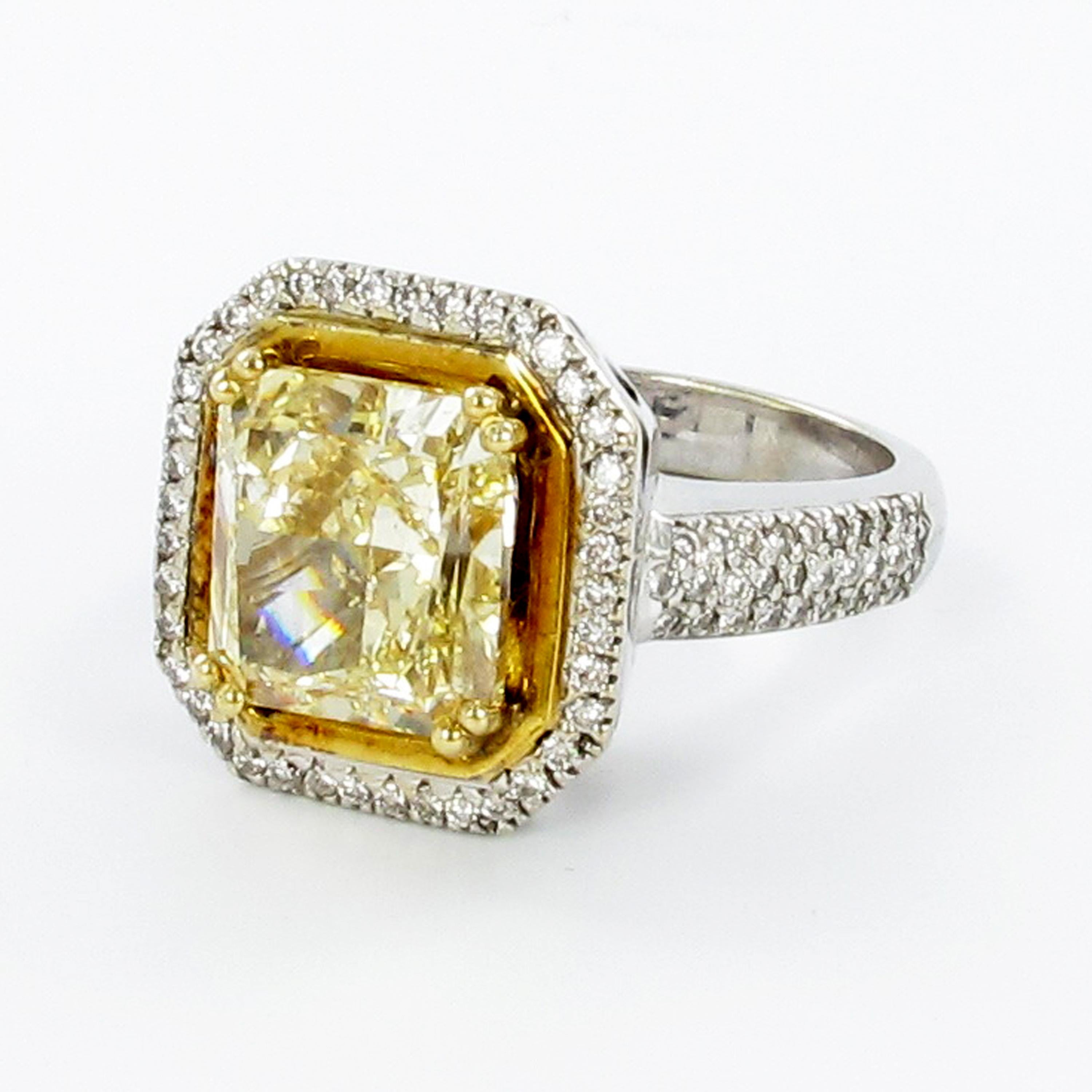 Contemporary GIA Certified 5.30 Carat Yellow Diamond Ring