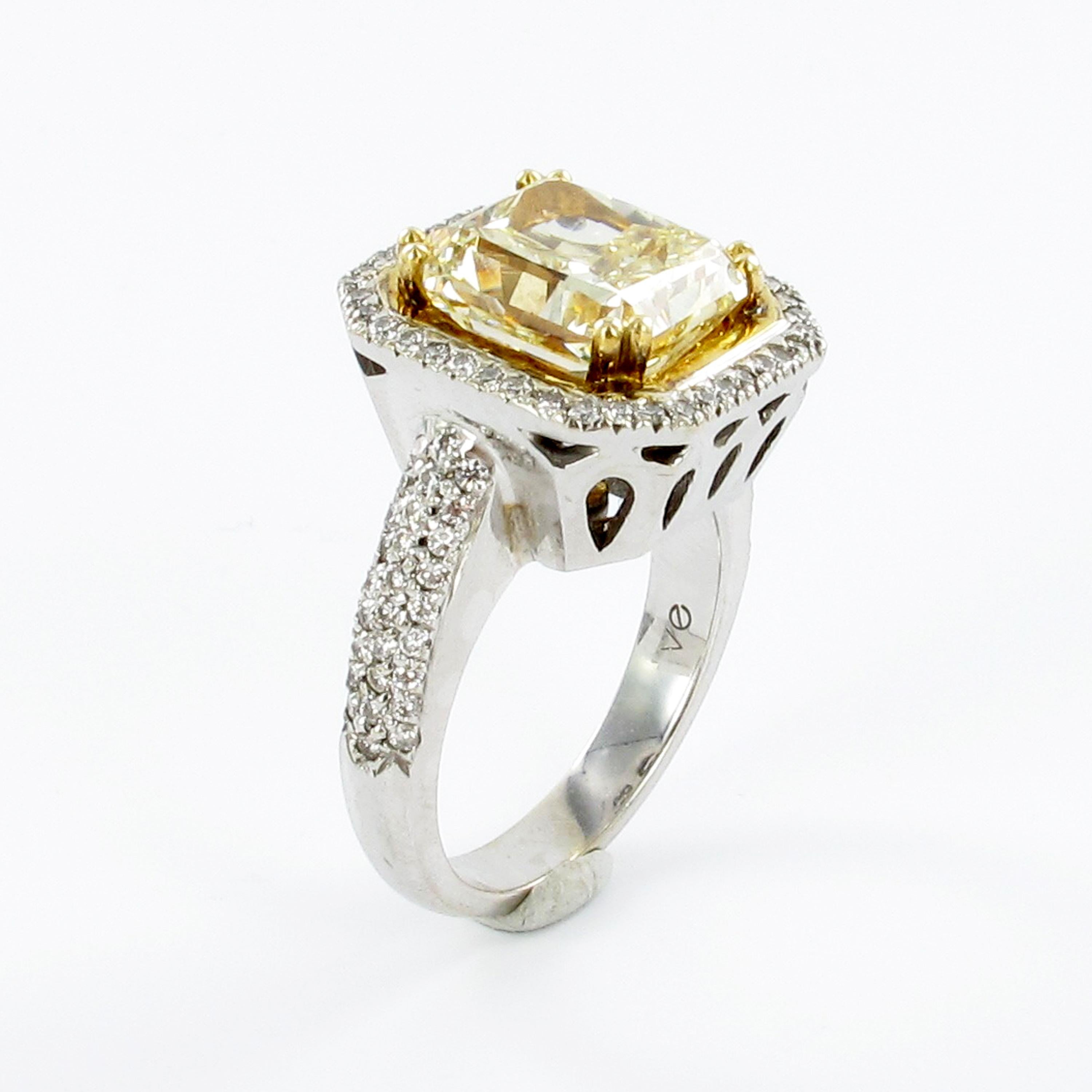 Radiant Cut GIA Certified 5.30 Carat Yellow Diamond Ring