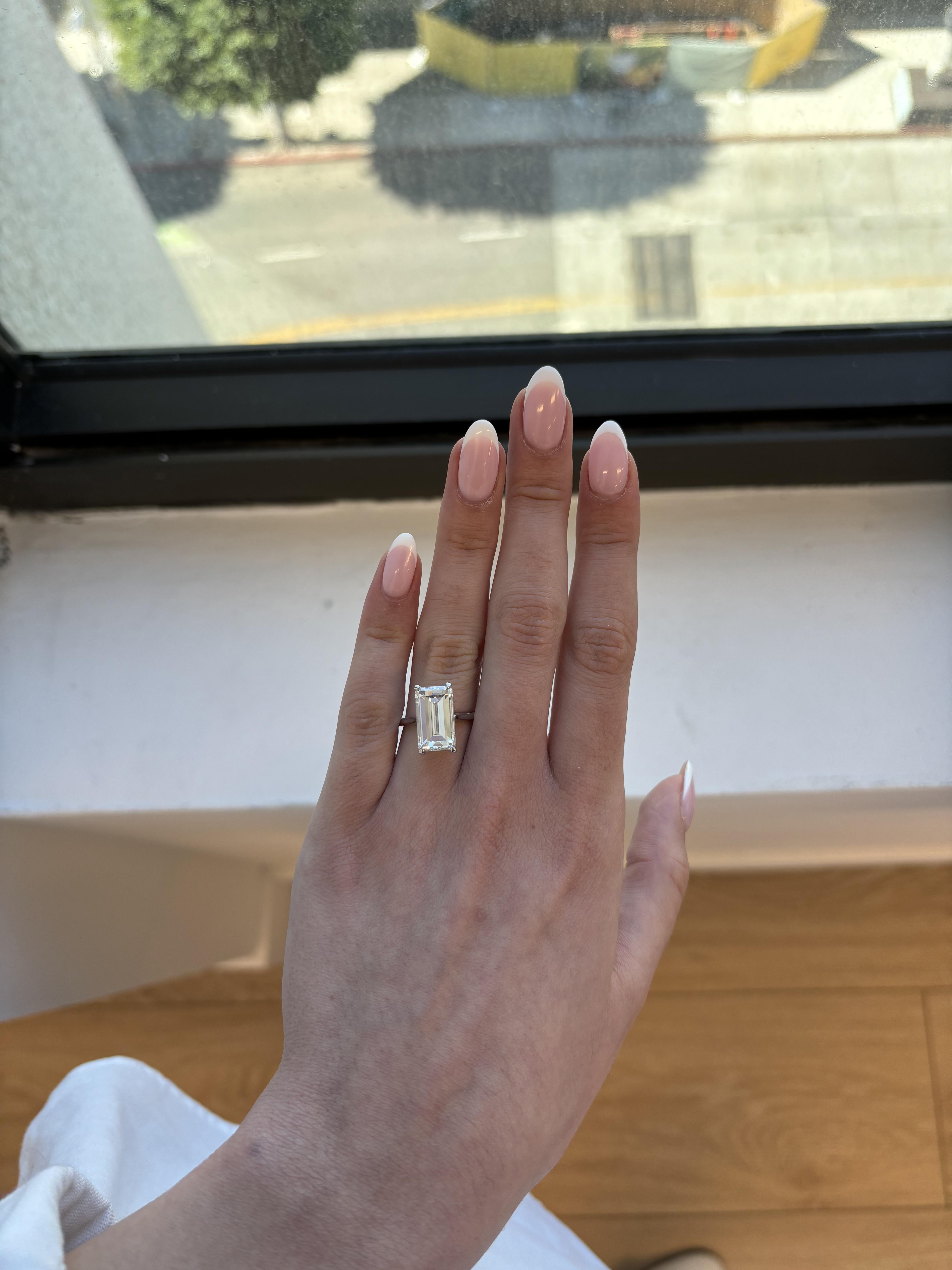 Classic solitaire diamond engagement ring.
5.34 carat emerald cut diamond. GIA certified K color grade and VS1 clarity grade. 14-karat white gold, 4.47 grams, current ring size 6.25.
Accommodated with an up to date digital appraisal by a GIA G.G.,