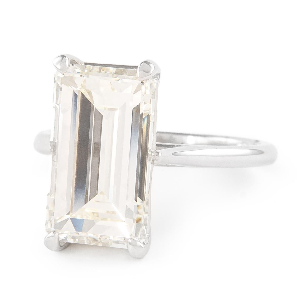Contemporary GIA Certified 5.34ct Emerald Cut K VS1 Diamond Engagement Ring White Gold For Sale