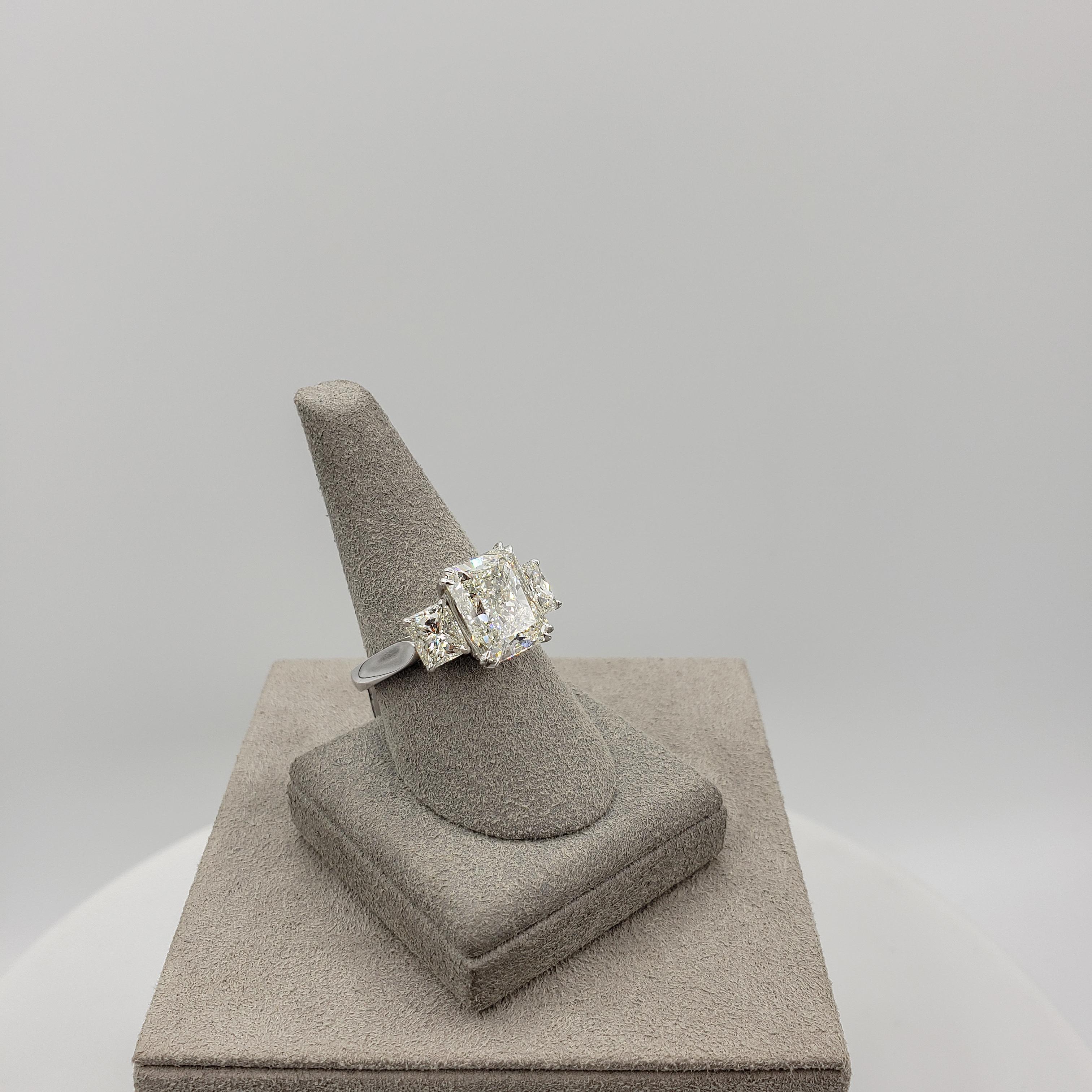 Women's GIA Certified 5.39 Carats Radiant Cut Diamond Three-Stone Engagement Ring For Sale