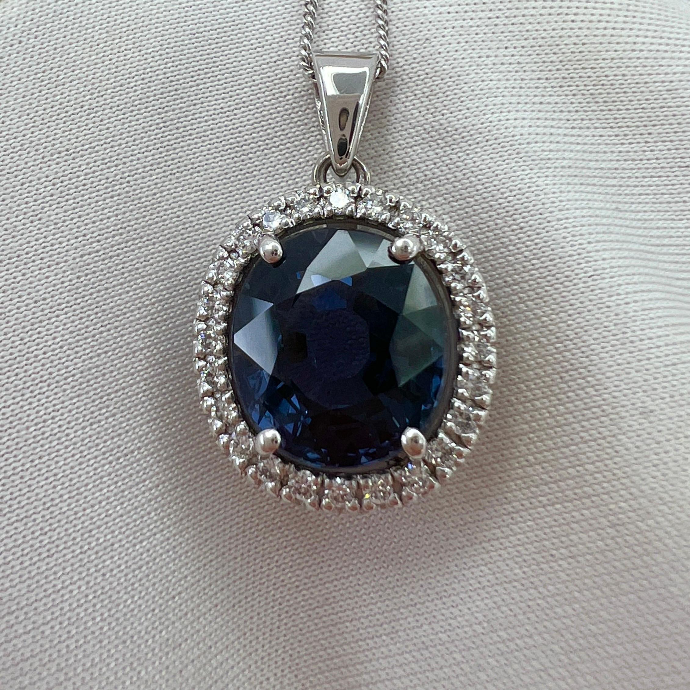 Rare GIA Certified Colour Change Spinel & Diamond 18k White Gold Halo Pendant Necklace.

Large 5.39 Carat centre spinel with a rare colour change effect, changes colour from violetish blue to purple depending on the light it is viewed. A unique and
