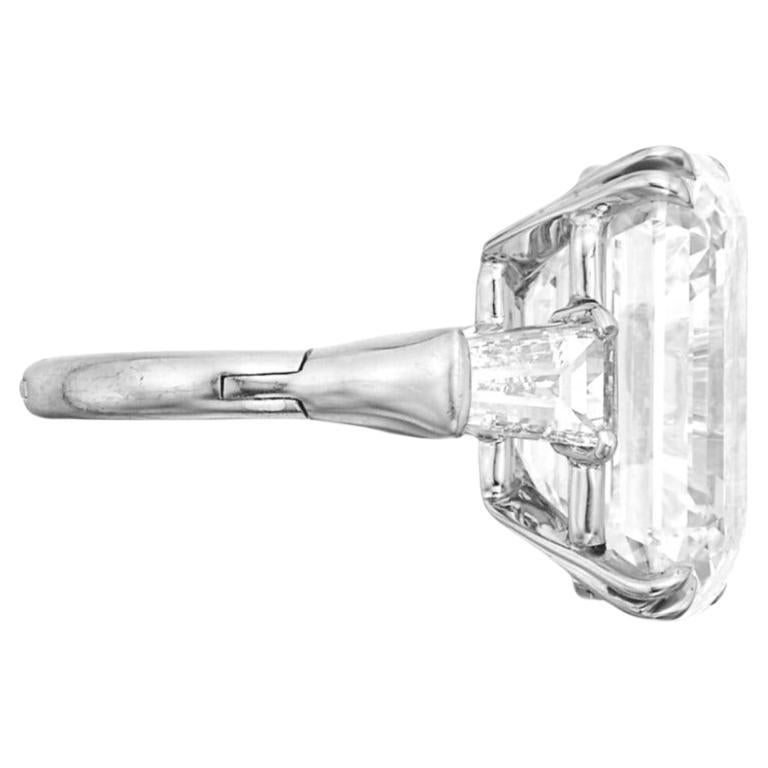 5.40 carats. Graded as I in color and VS2 in clarity, this diamond showcases remarkable qualities, including a very good cut, excellent polish, and very good symmetry, with no fluorescence. 

Set in luxurious platinum, the ring is a size 6,