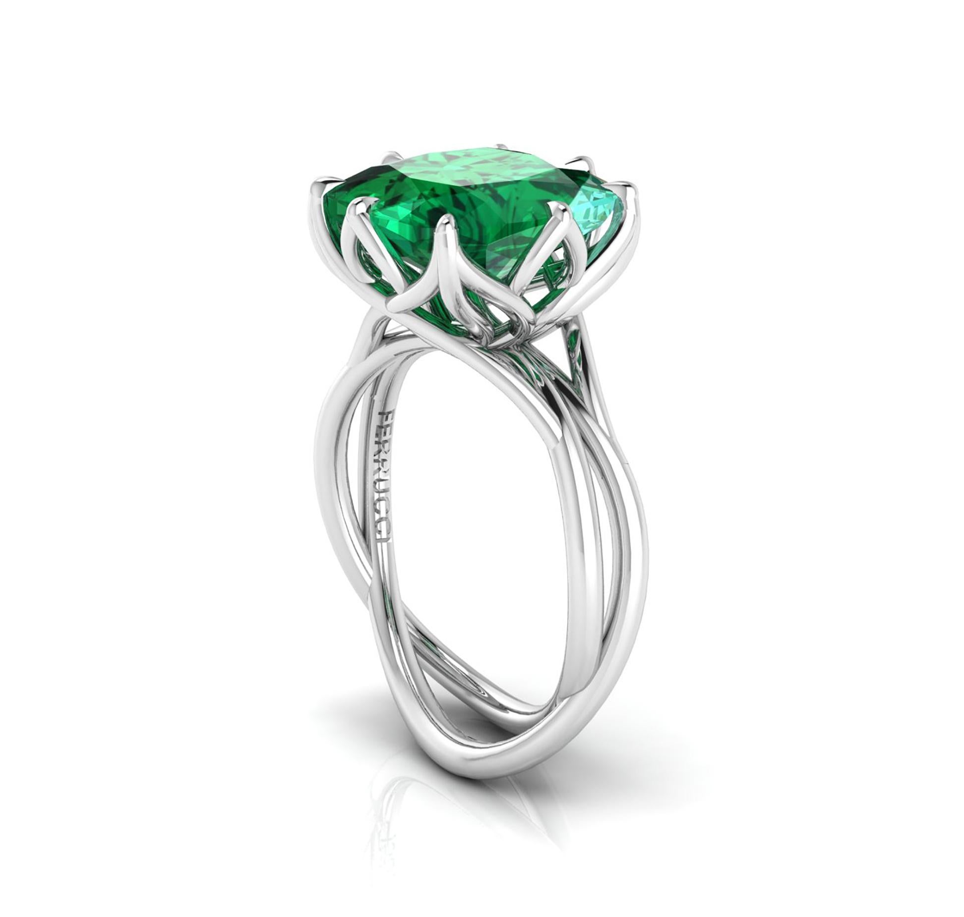  5.42 deep green natural Emerald  GIA Certified, in a one of a kind, hand made Platinum 950, designed and conceived in New York City. A design that recall nature's vines and ever flowing life of exotic flowers, with a modern prospective. 
This ring