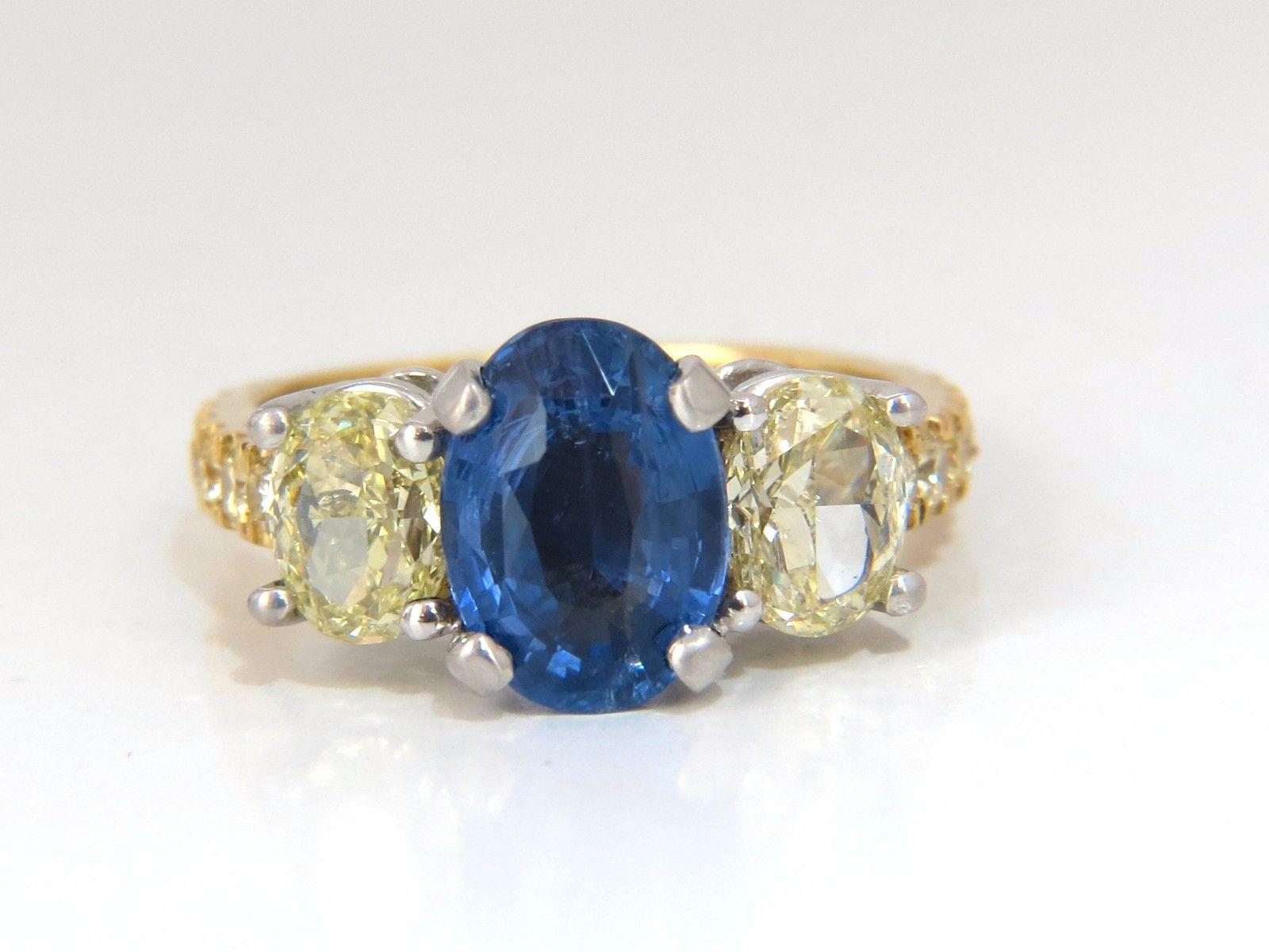Three Stone Royale.

GIA Certified 

3.14ct. Natural Blue Sapphire ring.

Report:  1182115083 (attached)

Oval cut: 10.08 X 7.26 X 4.89mm

Transparent, Blue Color

No Heat & No Enhancements.



1.78ct. Side natural oval (2) diamonds.

Fancy Yellow,