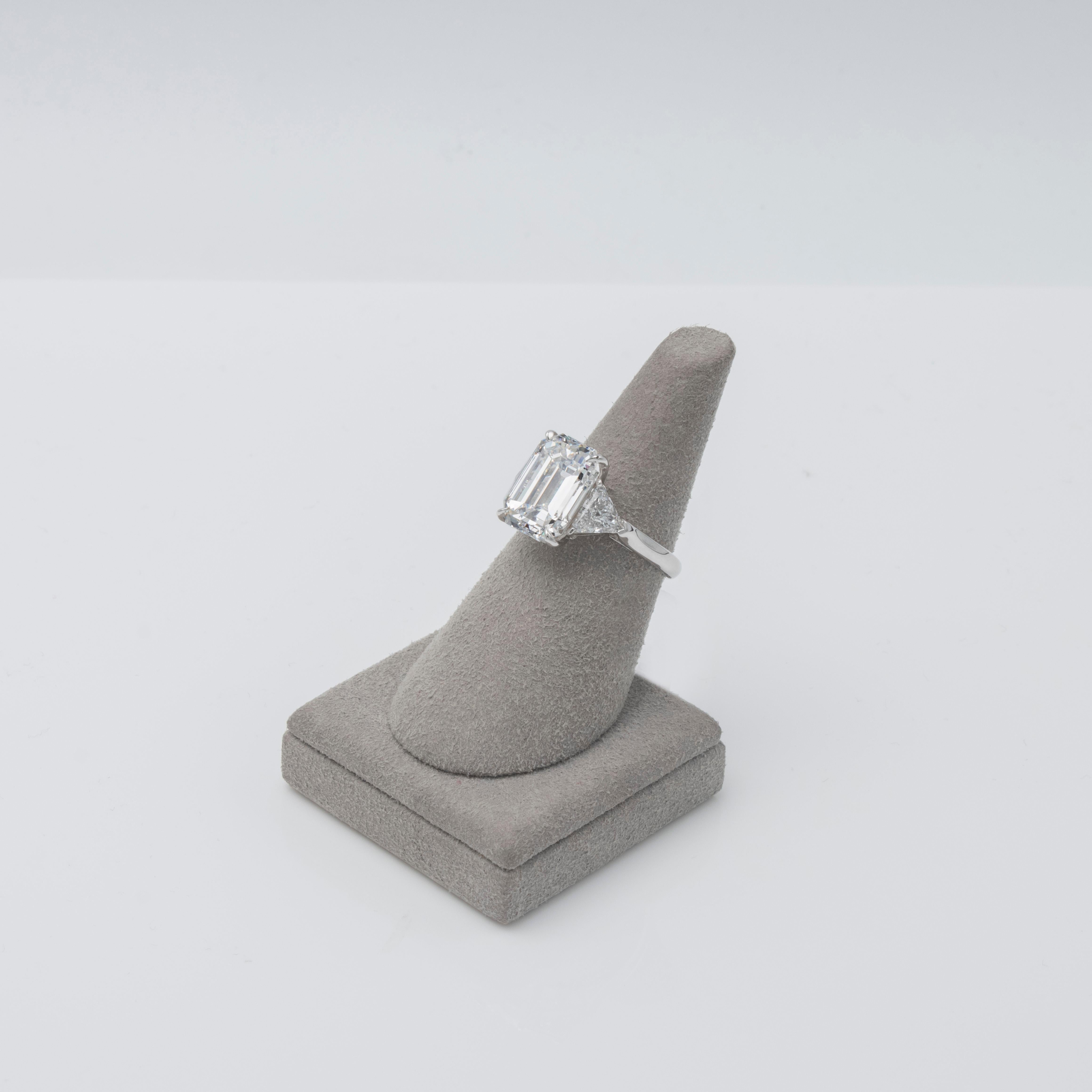 GIA Certified 5.46 Carats Emerald Cut Diamond Three-Stone Engagement Ring In New Condition In New York, NY