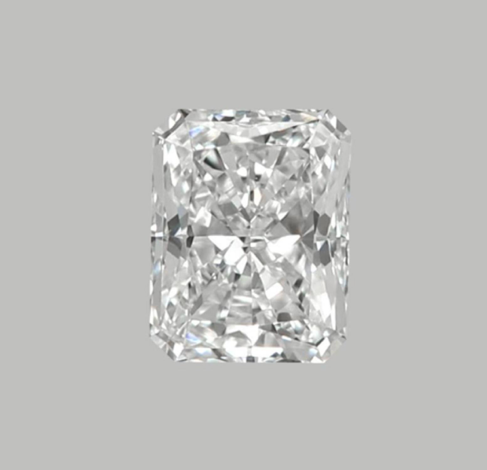 This exquisite ring features a GIA-certified 5.01-carat radiant-cut diamond, set in a sleek platinum band with tapered baguette side stones for added elegance. 

The diamond, with a G color grade, showcases near-colorless brilliance, offering a