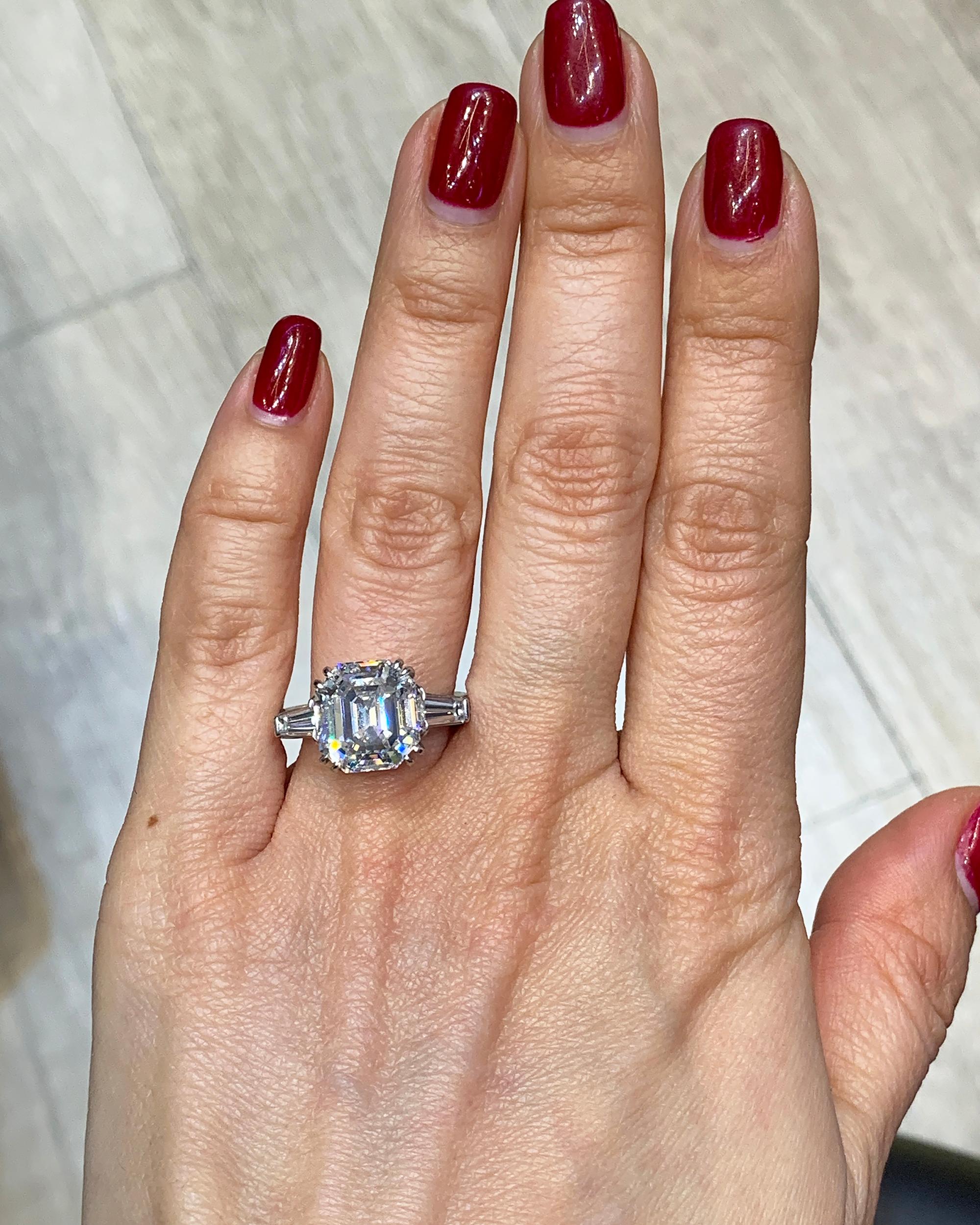 Like an opera singer in her prime, this Diamond Engagement Ring, made by Spectra Fine Jewelry in the Contemporary era, 2018, hits all the high Cs—cut, carat, color, and clarity. The emerald-cut diamond weighs an estimated 5.51 carats. It is
