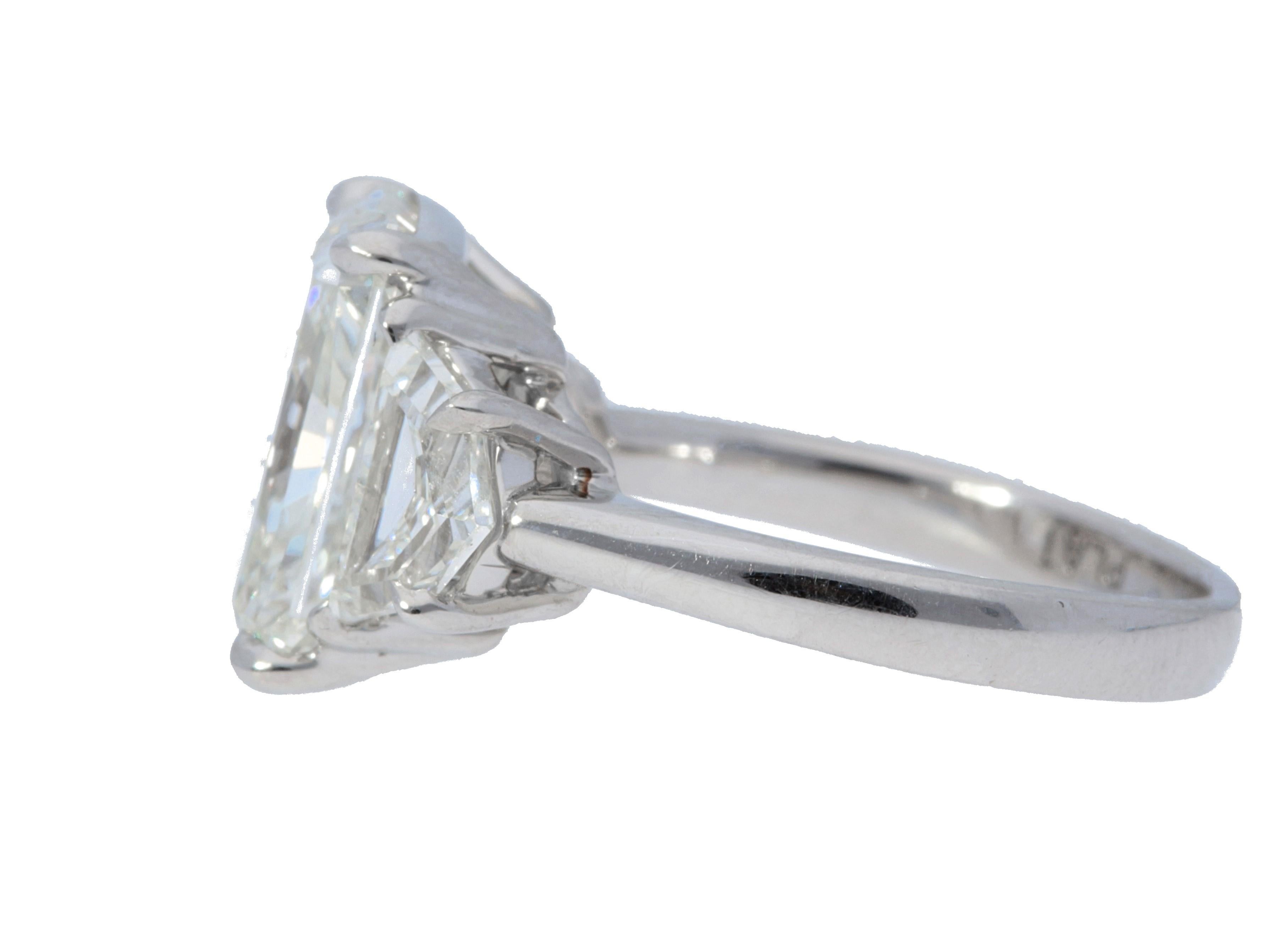 Contemporary GIA Certified 5.52 Carat Radiant Three Stone Ring For Sale