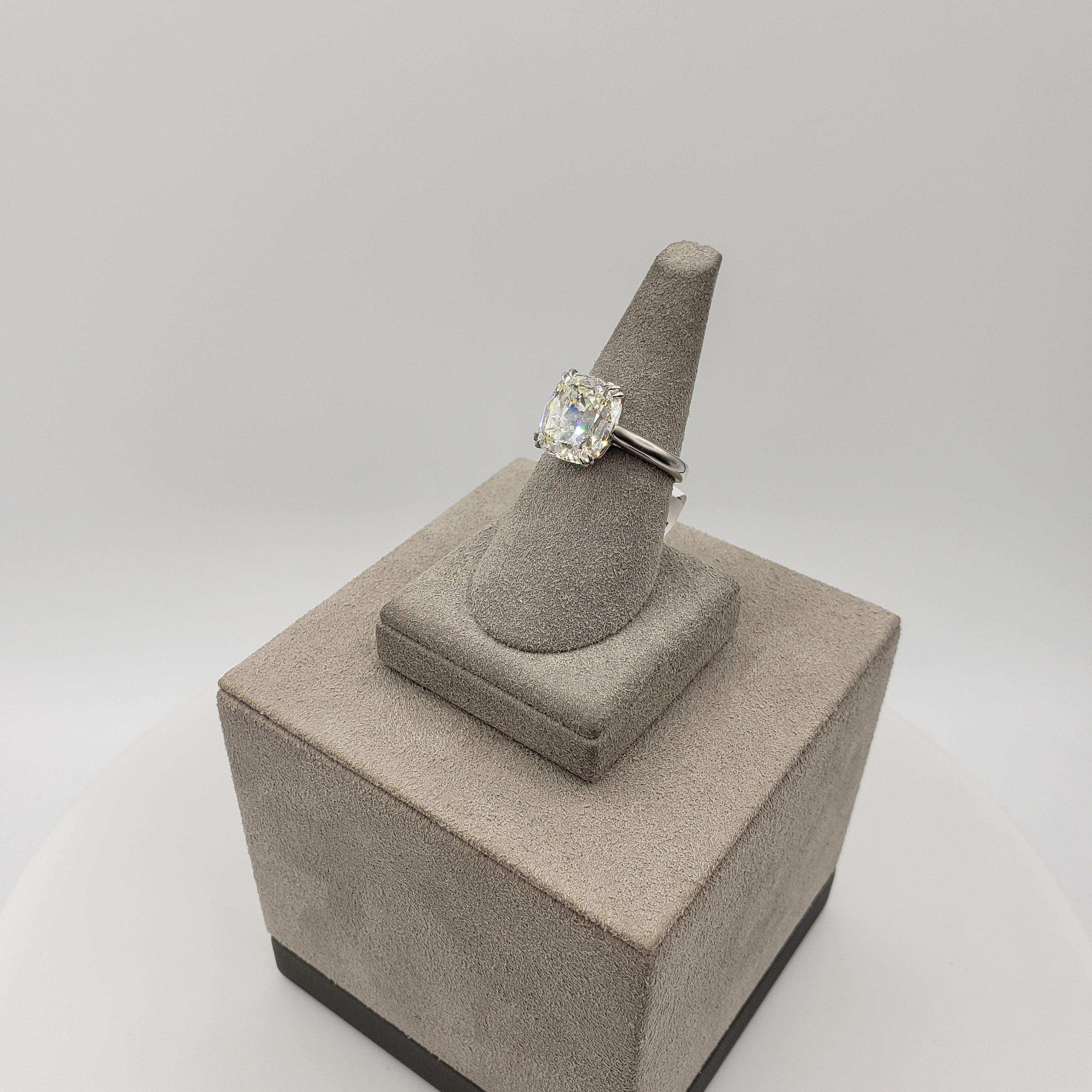 Contemporary GIA Certified 5.53 Carats Cushion Cut Diamond Solitaire Platinum Engagement Ring For Sale