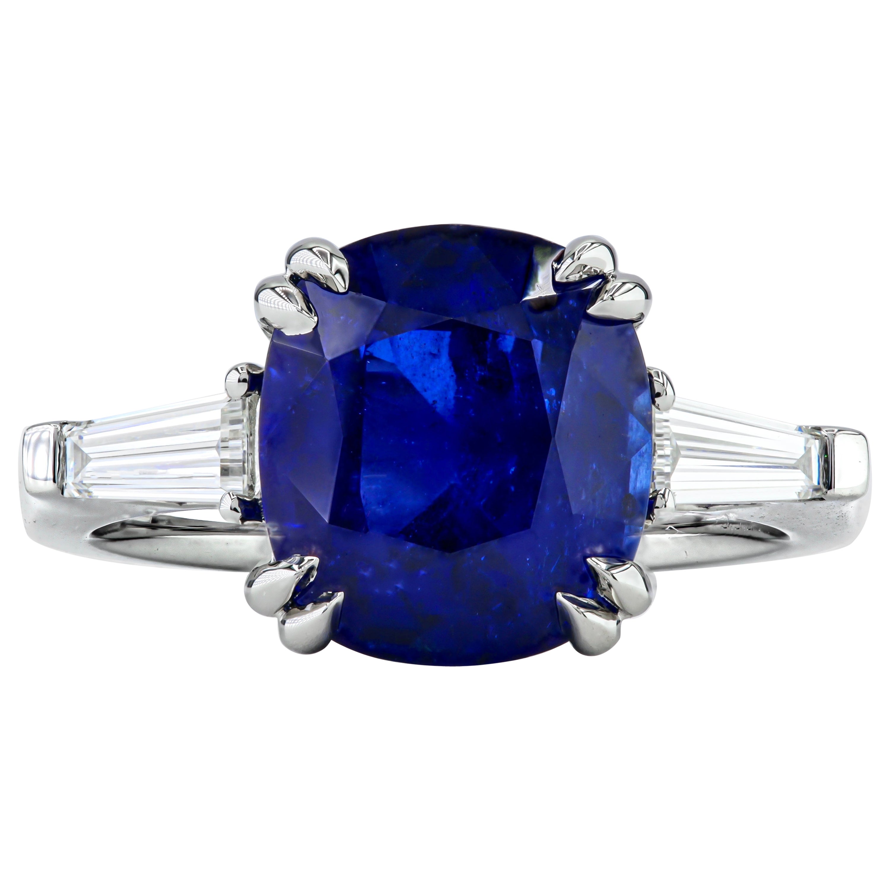 GIA Certified 5.54 Carat Cushion Sapphire Three Stone Ring in Platinum For Sale