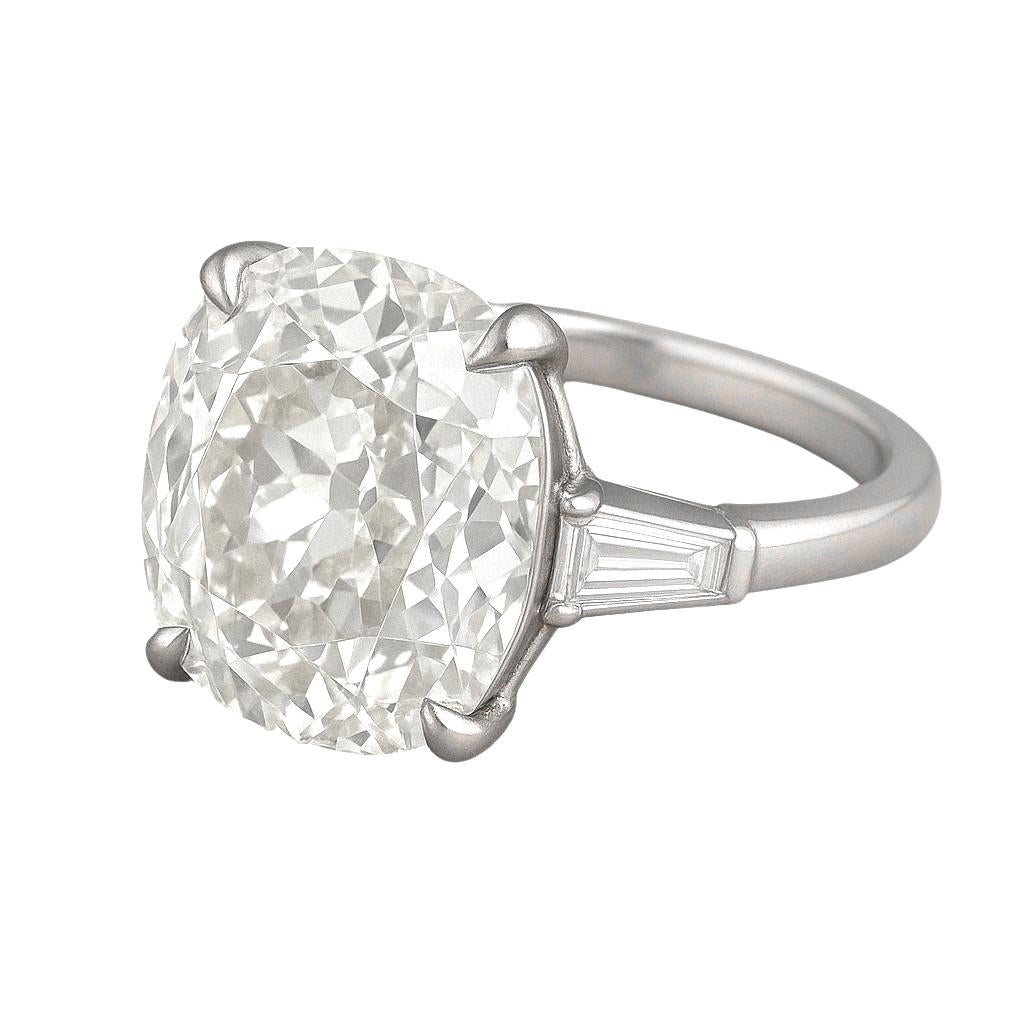 This extraordinary engagement ring centers a GIA-certified 5.30 carat Old European Brilliant Cut diamond, exuding timeless charm and antique elegance. The diamond is graded L color and VS1 clarity, offering impressive transparency and brilliance for