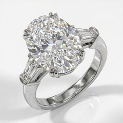 GIA Certified 5.02 Carat Oval Cut Diamond Engagement Ring with tapered baguette