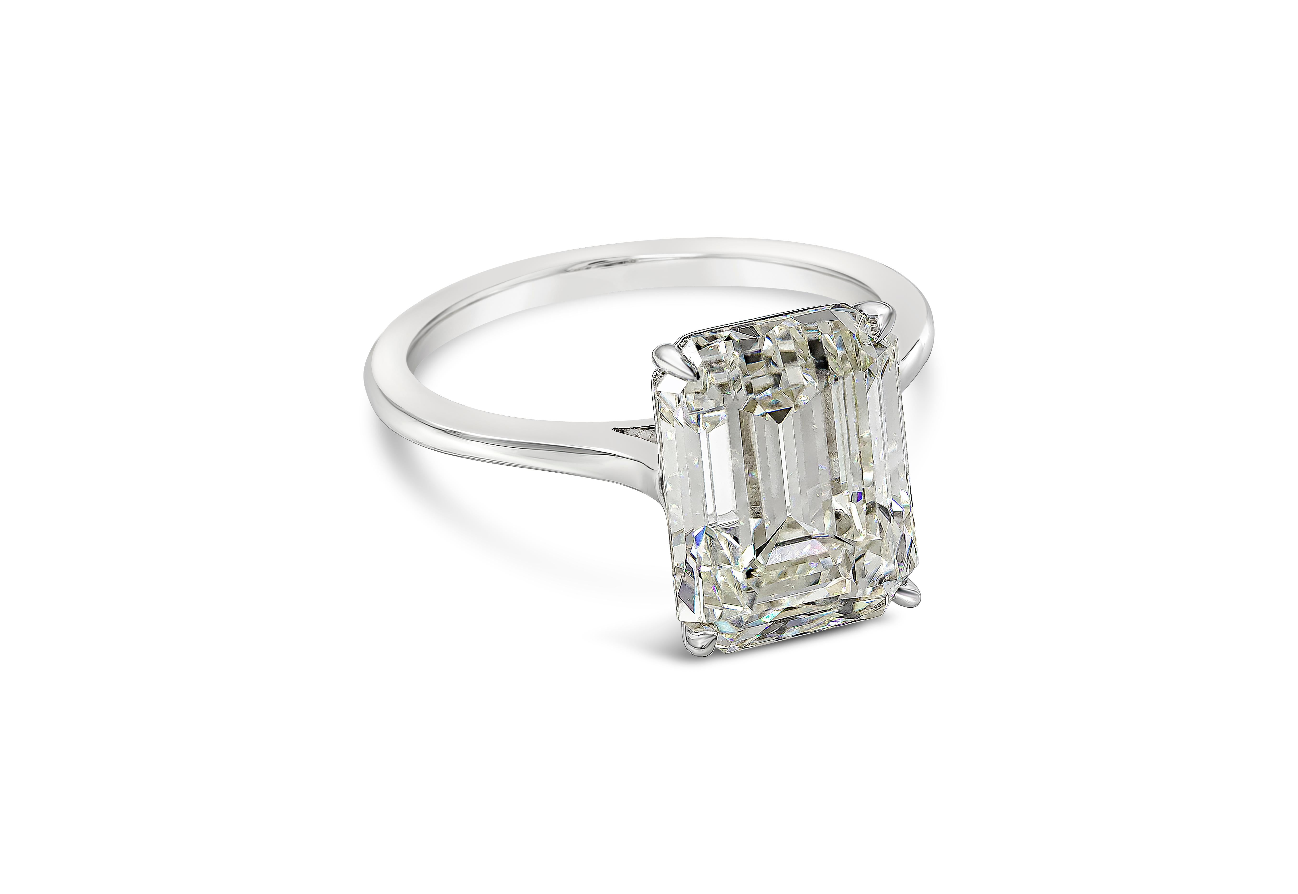 A classic and timeless engagement ring style showcasing a 5.56 carat total emerald cut diamond certified by GIA as K color and VVS2 in clarity. Set in a thin mounting made in 18K white gold. Size 6.5 US and resizable upon request.

Roman Malakov is
