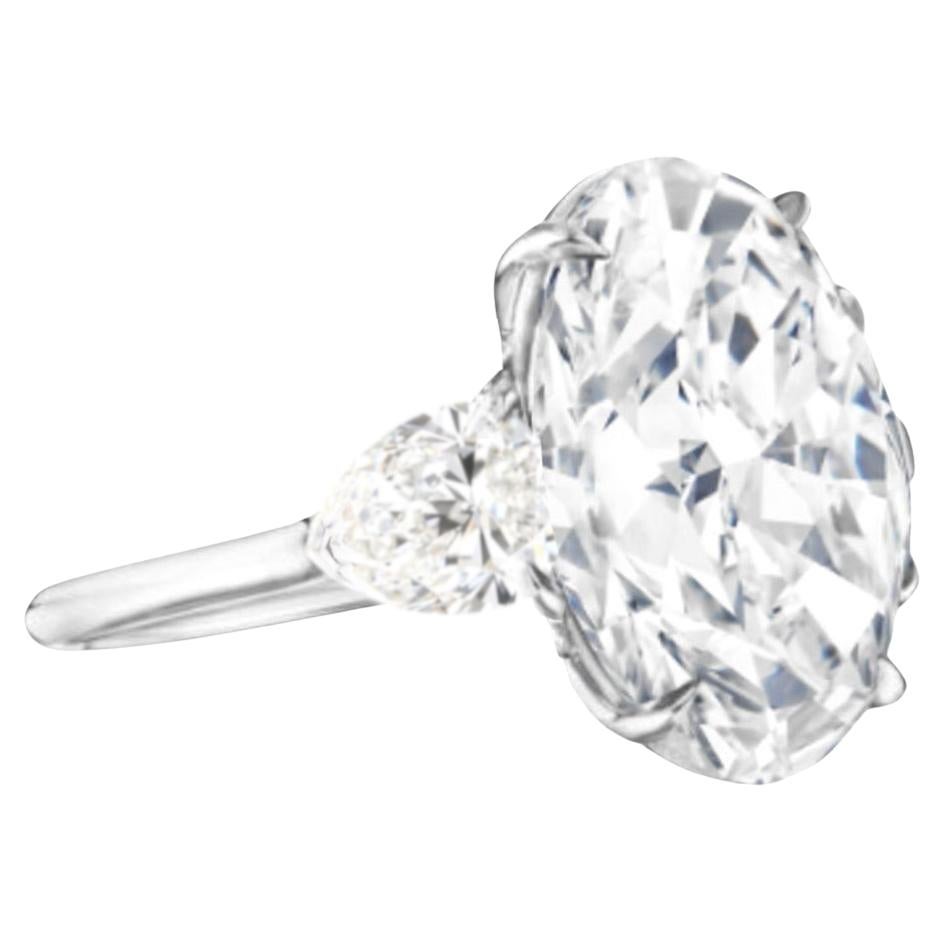 Contemporary GIA Certified 5.22 Ct Oval Cut Diamond with Pear Cut Diamond in 18K White Gold For Sale
