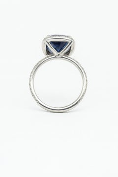 GIA Certified 5.58 Carat Vivid Blue Sapphire and Diamond Platinum Ring
