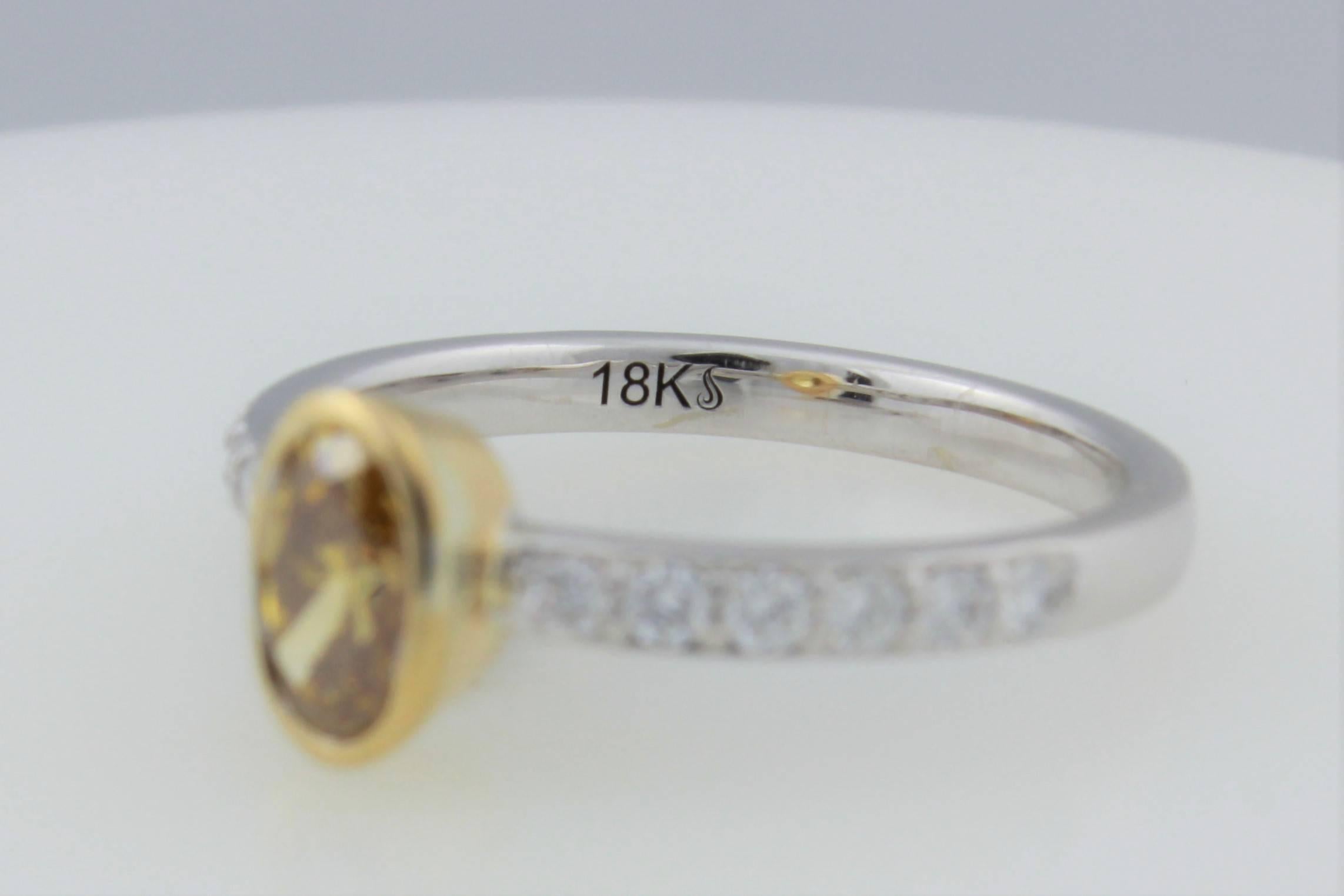 Women's GIA Certified .56 ct Orange Yellow Oval Diamond In 18kt Two Tone Diamond Ring  For Sale