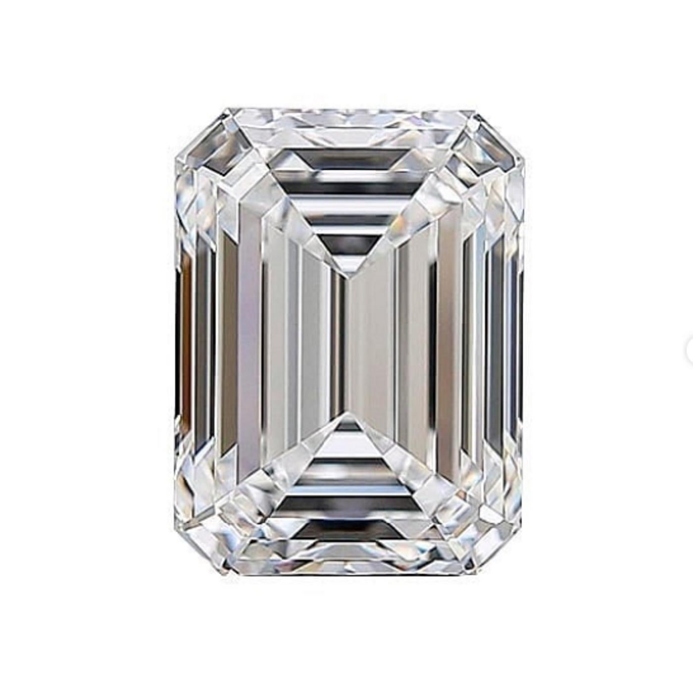 This lovely and rare ring centers on a 5 carat emerald-cut diamond This stone is flanked by two emerald cut diamonds mounted in platinum. 

This diamond also has the perfect proportions the ideal emerald cut diamond should have.

Nowdays Emerald