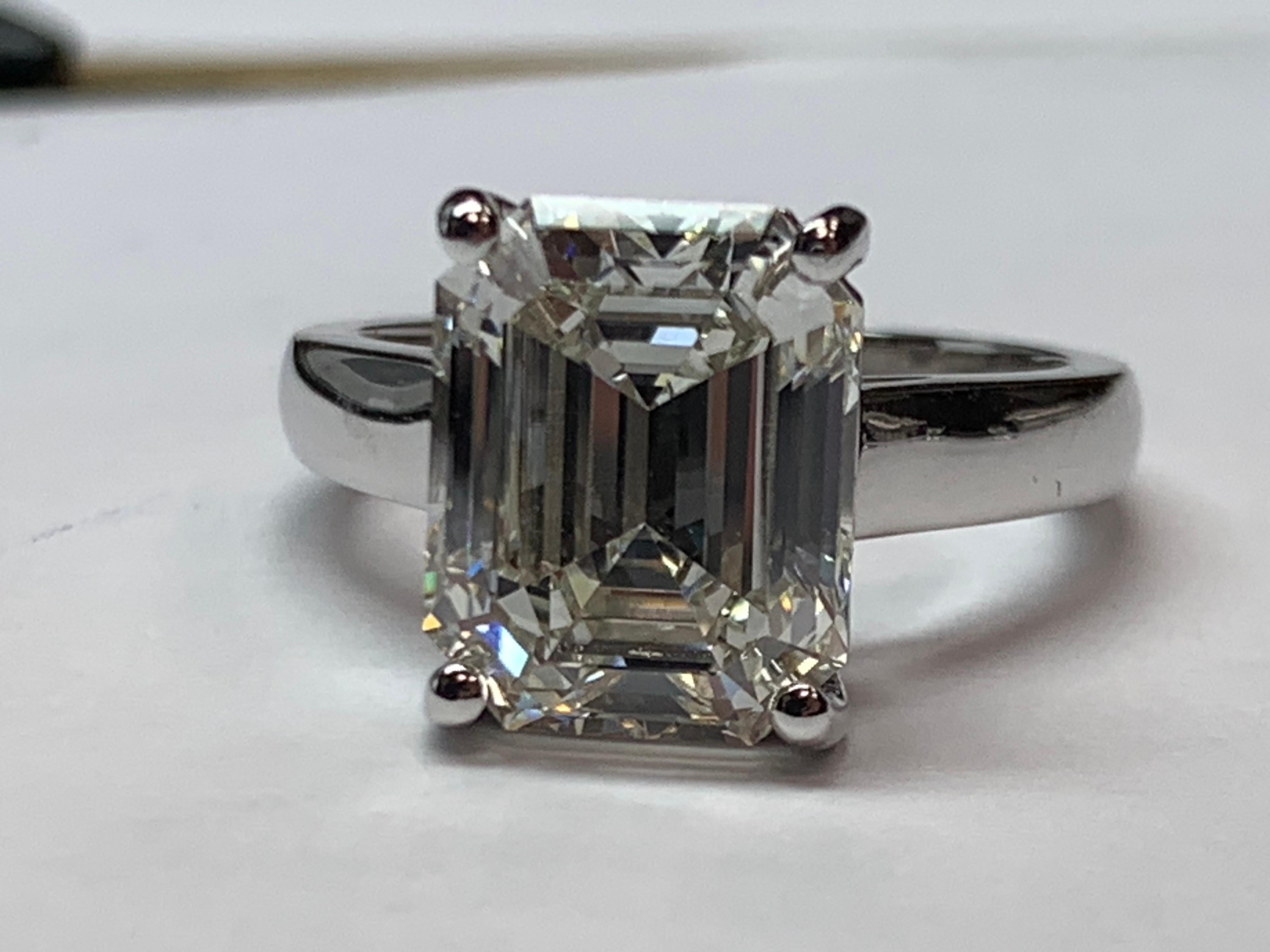 Women's GIA Certified 5.60 Carat Natural Emerald Cut Diamond I VS1 None Engagement Ring