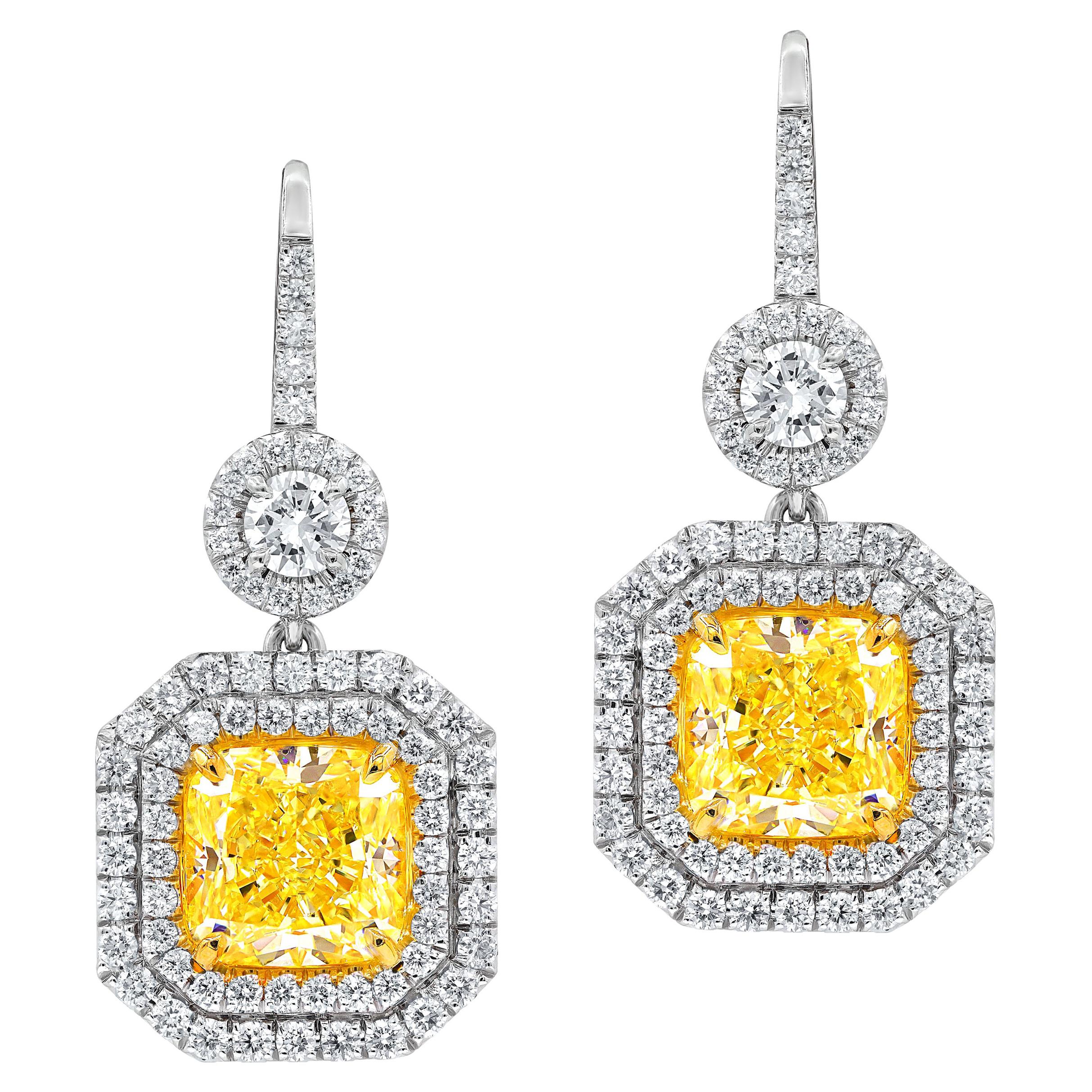 GIA Certified 5.63 Carat Canary Yellow Diamond Earrings For Sale at