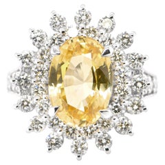 GIA Certified 5.65 Carat Natural, Unheated Yellow Sapphire Ring Set in Platinum